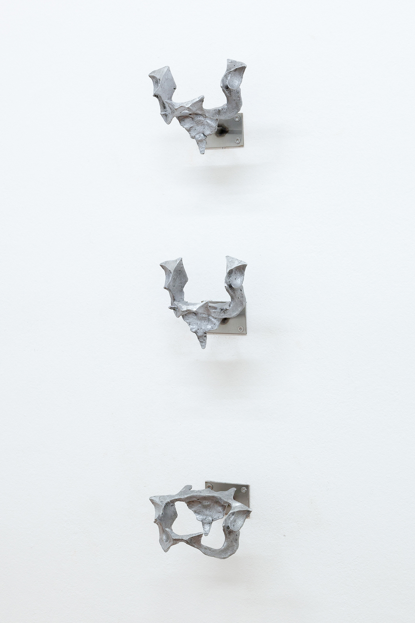 Ellie Hunter, Khora I â€“ III, 2021. Cast aluminum and stainless steel. Exhibition view, Loggia. Photo: Flavio Palasciano.