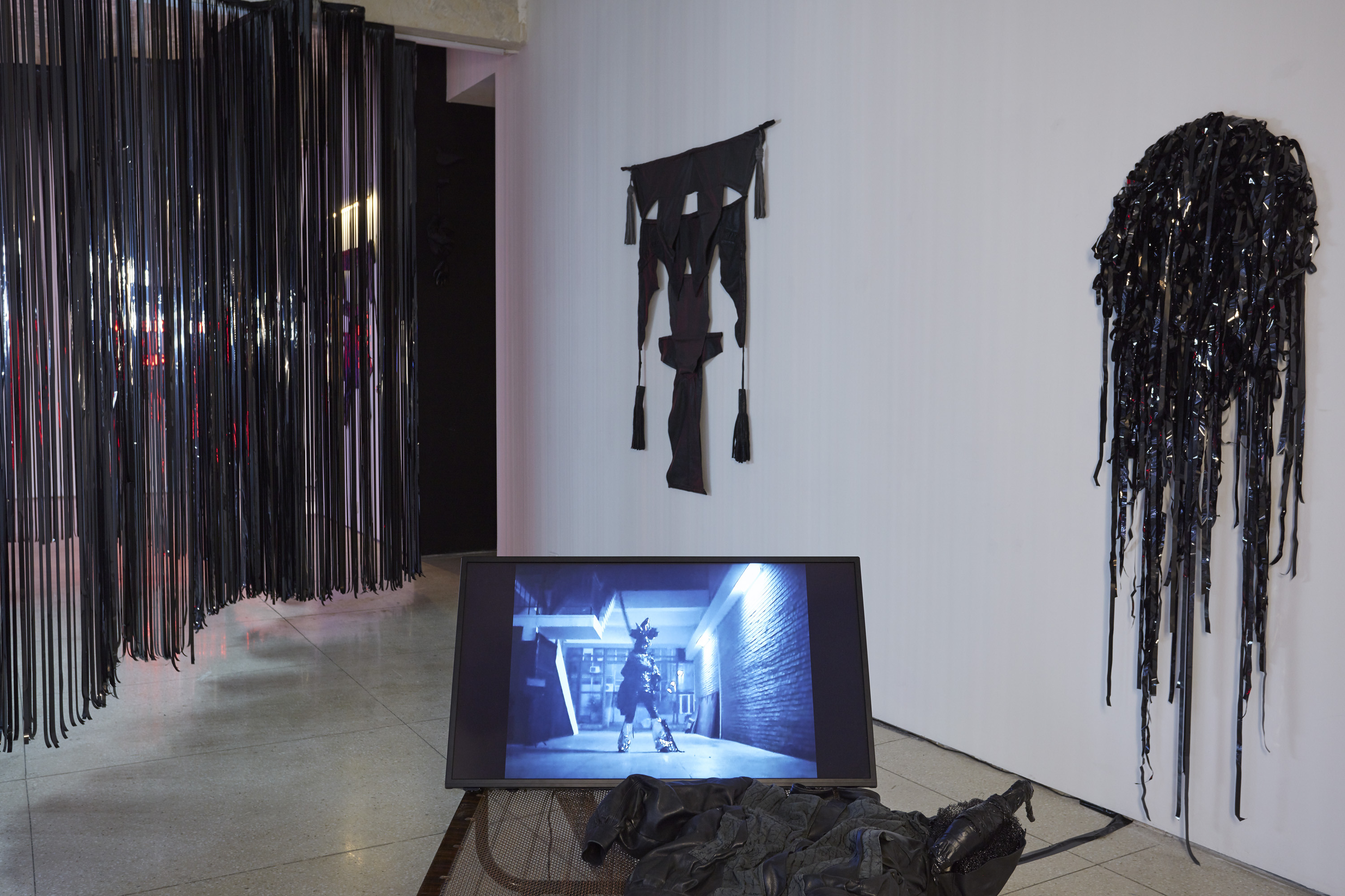 2. exhibition view w “The Owls Are Not What They Seem” (curtain), “SEX TAPE VIII”, “Banner 11:11”, “Black Mirror 003” (from left to right), photo: Mihaela Vezentan