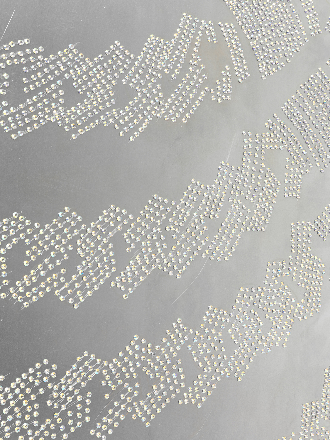 Alfa Bransfield, Three (Thug Votive), 2022, Aurora Borealis Diamanté on engraved aluminium, 150 à 100 à 3.5 cm