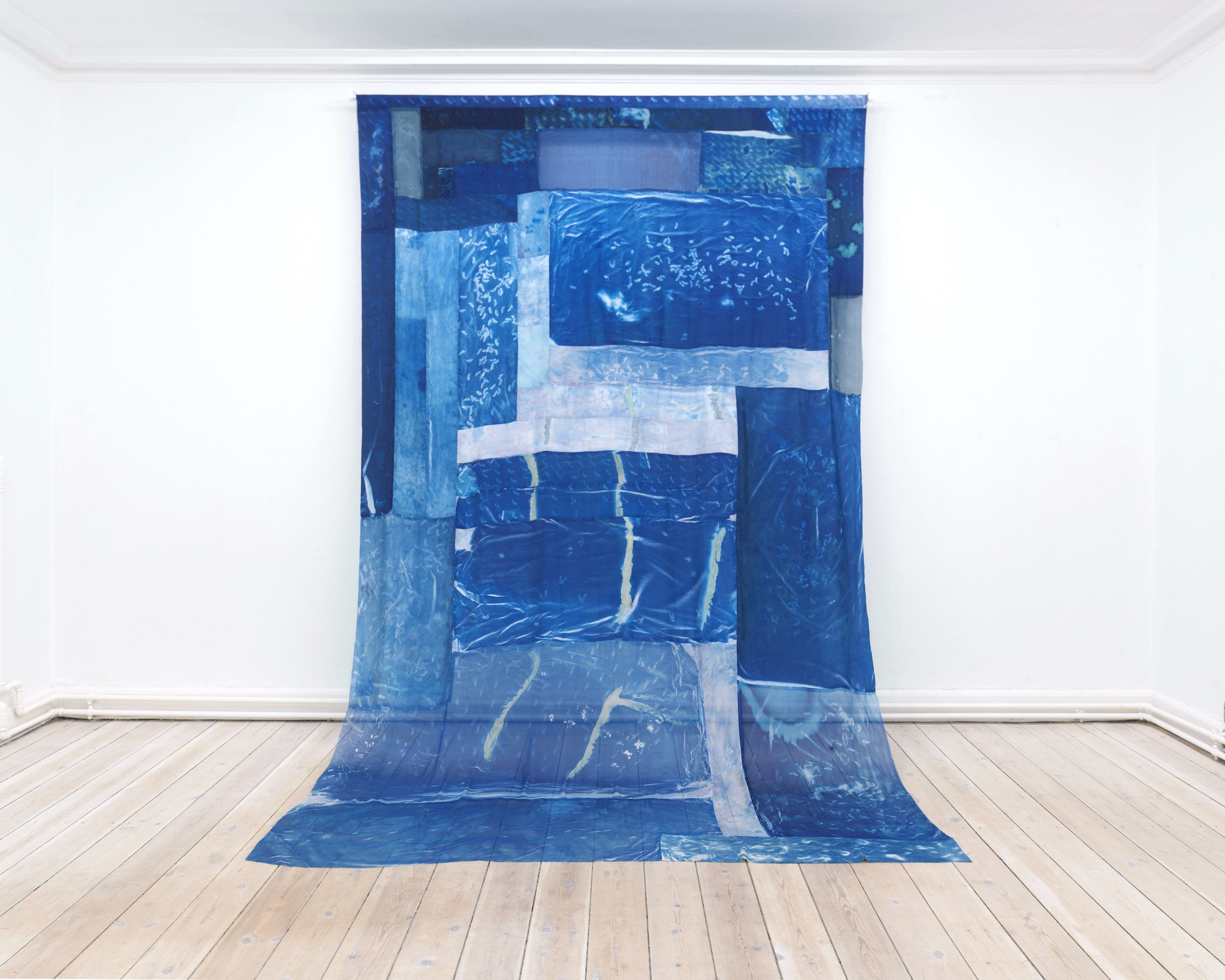Dyveke Bredsdorff, âWomen Walking / Women Marching (Night Walkers), 2022-2023. Cyanotype on chiffon, satin and heavy weight silk, bed sheets, embroidered cotton, 205.0 x 333.0 cm