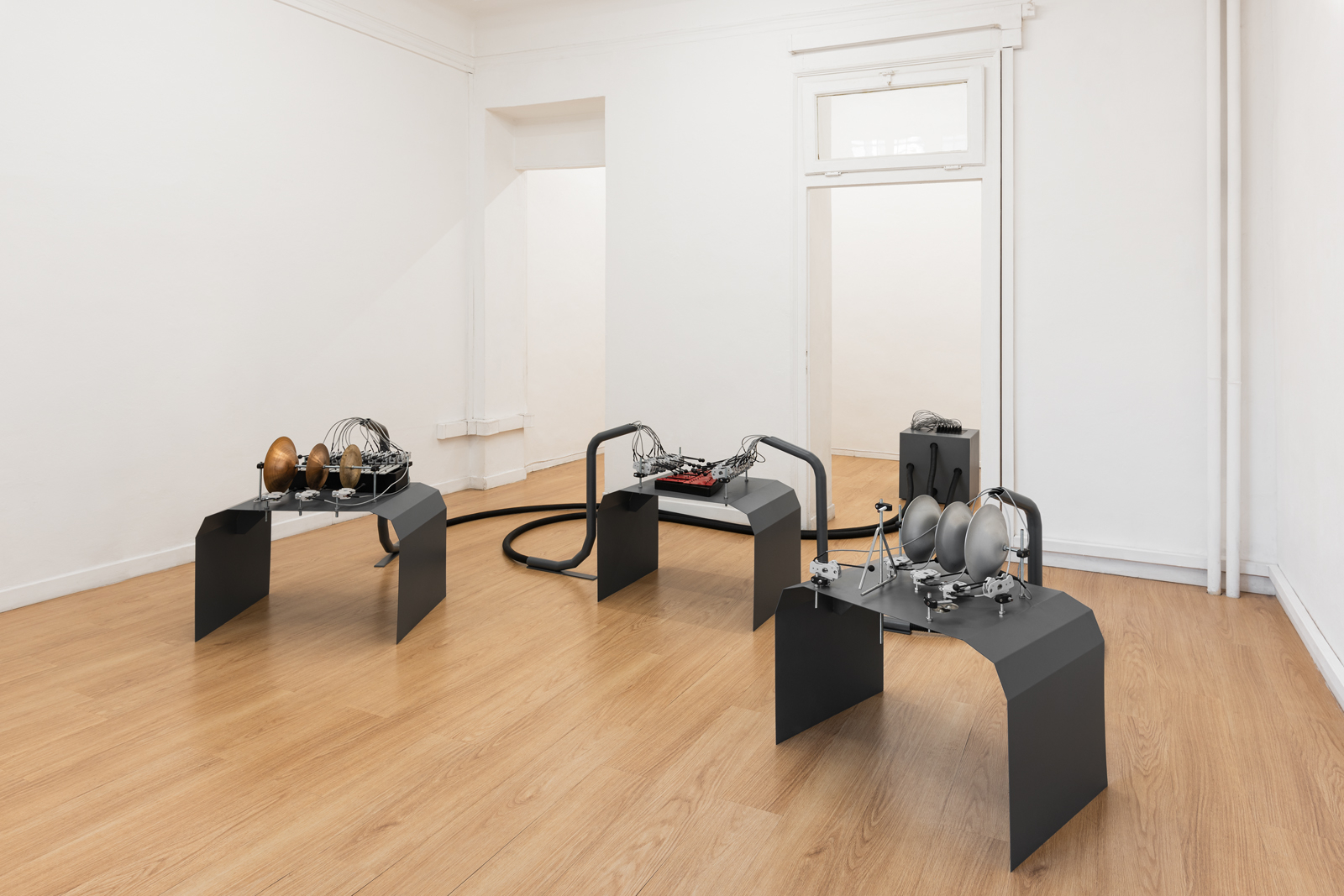 Matteo Nasini, A Distant Chime, 2023 Iron, steel. PVC, wood, PLC, 2 Glocken spiel, 6 tuning bell, triangle, cymbals Ambiental dimensions