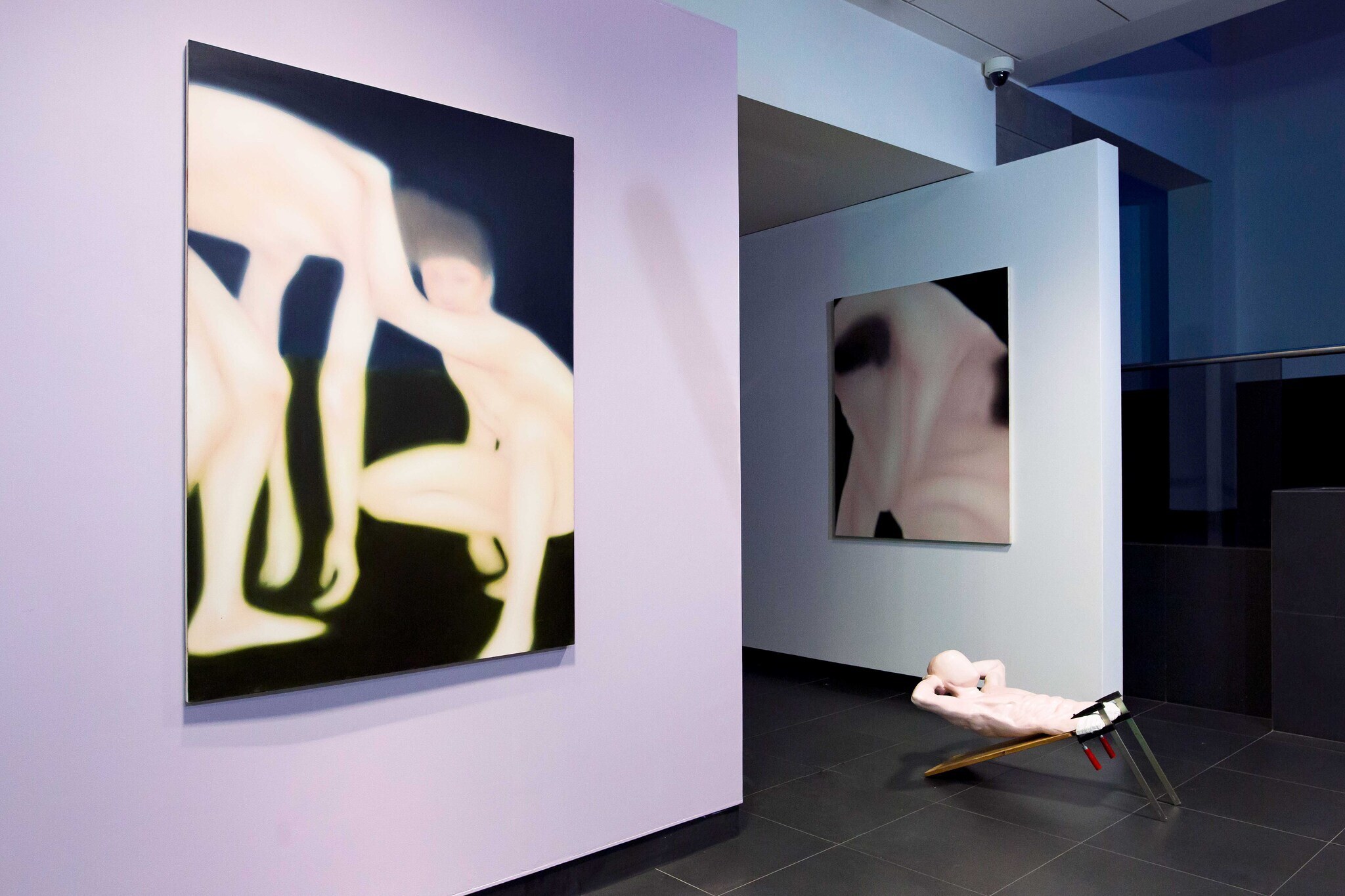 Julia Kowalska If you can't swallow it, turn around discreetly, and throw it somewhere, oil on canvas, 2022, Bartek Górny Squeeze, acrylic gypsum, 2012, Julia Kowalska untitled, oil on canvas, 2022. Courtesy of Krupa Collection