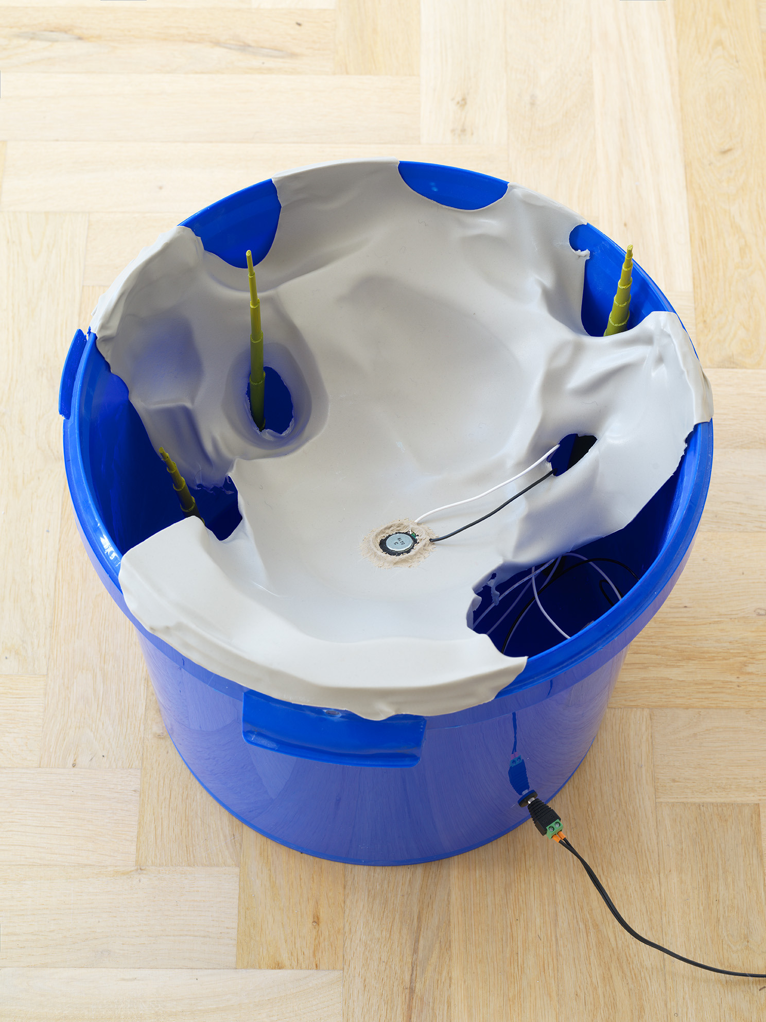 Becket MWN: Tuner (detail), 2023. Buckets, plastic, mp3 player, speaker, acrylic paint. dimensions variable