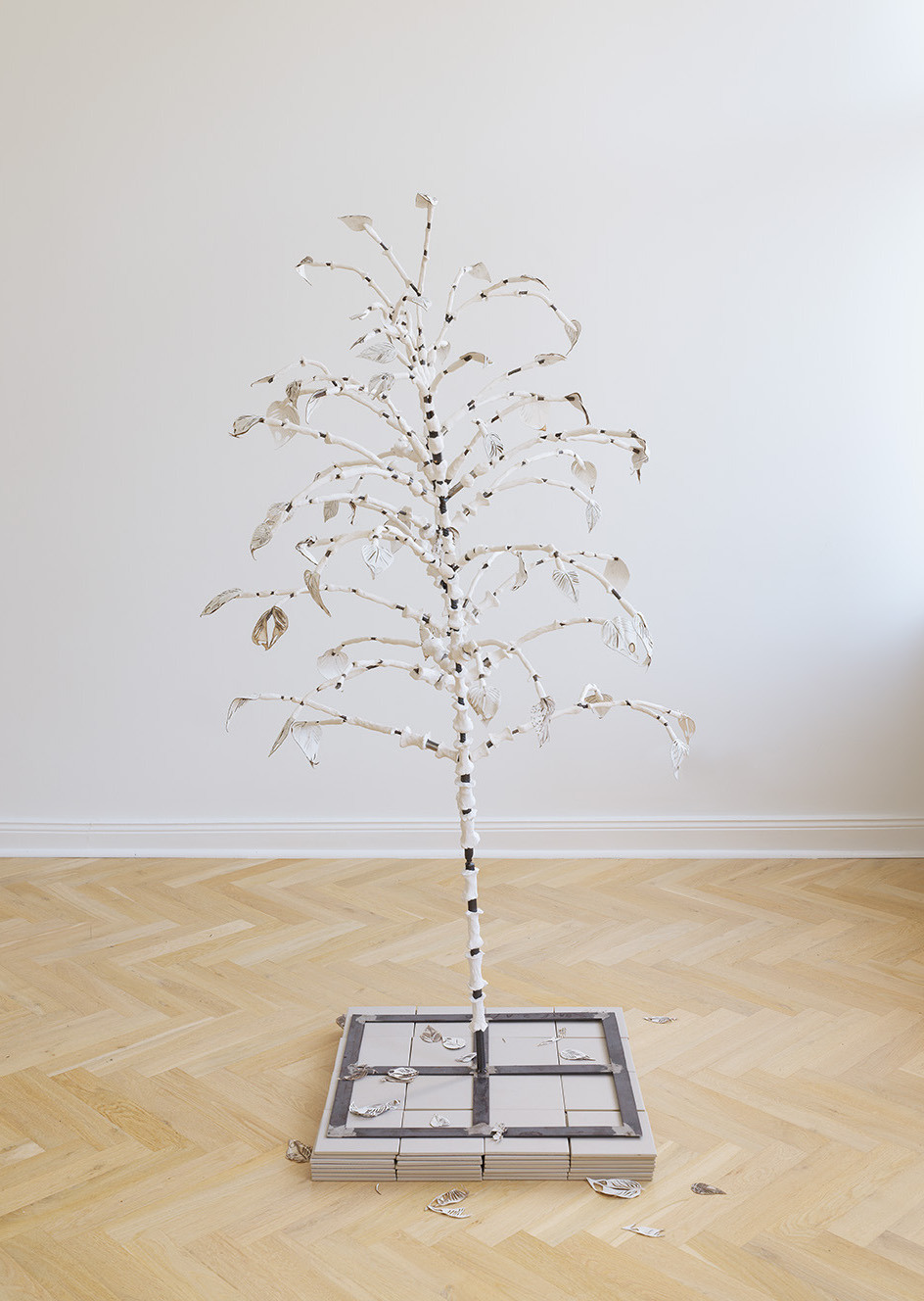 JosÃ© Montealegre: PÃ¡gina 0057 (What used to be, and still in a way is, M. Reus (Palo de MÃ¡scaras)), 2019-2023. Metal, air-dry clay, laser cut canvas, steel base, tiles. 175 x 105 x 85 cm (approximate dimensions, vary slightly)