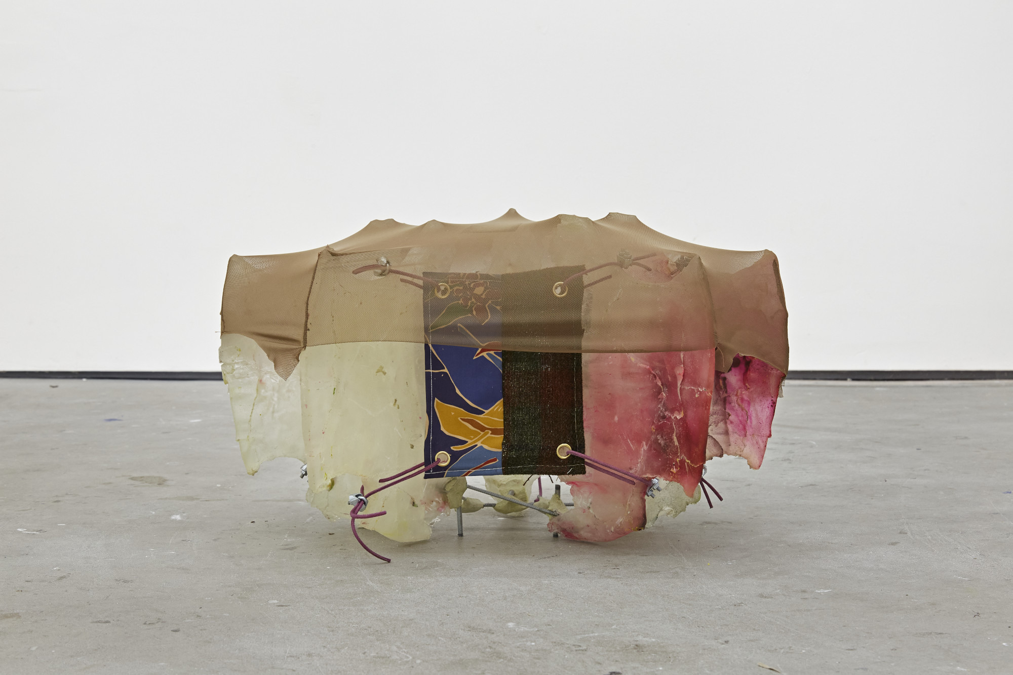   Bootleg Cocoon, 2023 - 2023. Epoxy resin, epoxy clay, pigment, fabric and cord, 33 (H) x 55 (W) x 48 (D) cm. 