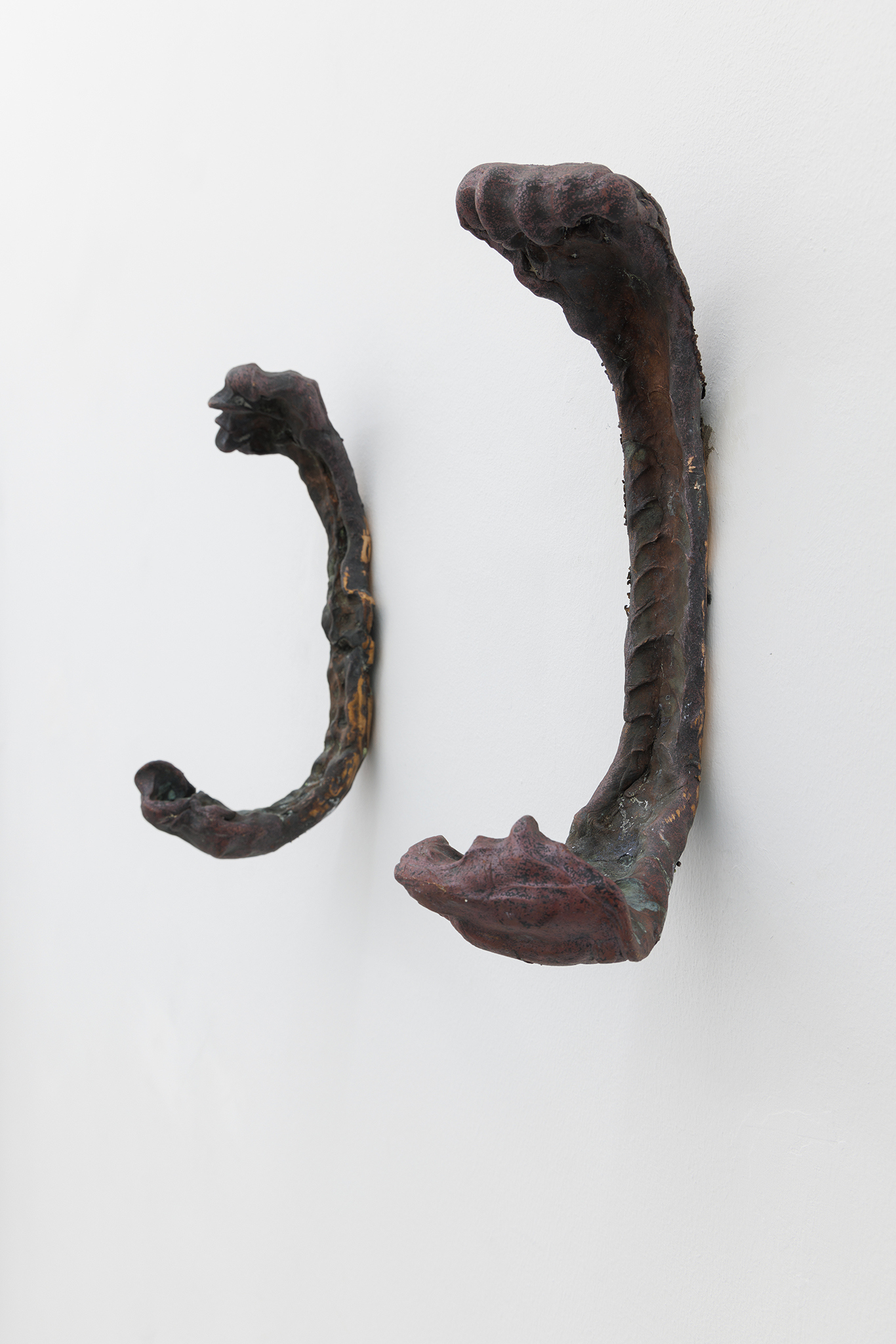 Kay Yoon, Defleshed, 2023, bronze, two-part work, Left: 35 x 10 x 11 cm, Right: 35 x 13 x 15 cm