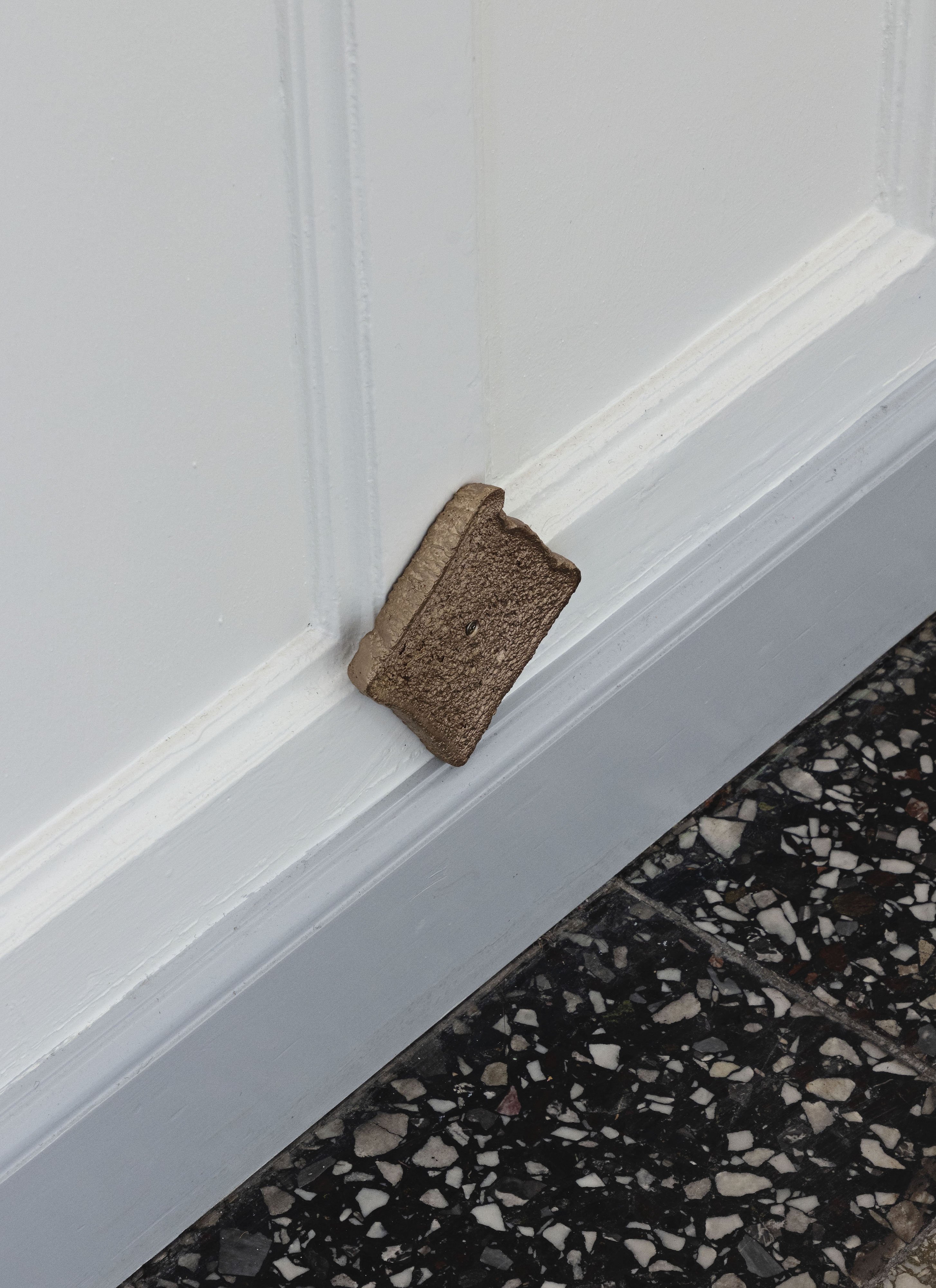 Benedikte Bjerre: Starry Night, 2023. Installation view OâOvergaden. Direct bronze cast of bread 32 parts. Each approx. 1 x 10 x 13 cm. Installation size variable. Photo: Laura Stamer