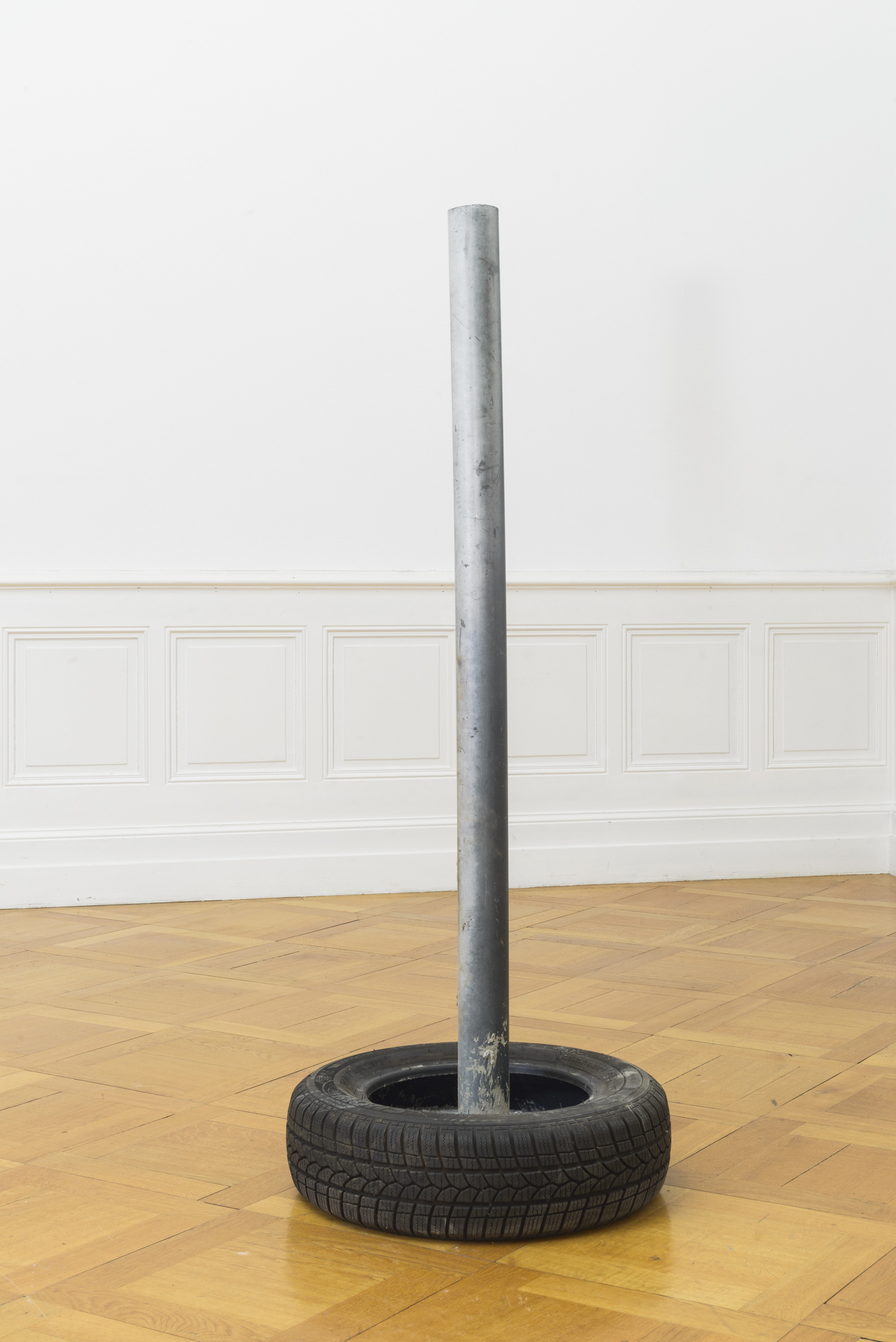 Yvan Alvarez, Parking (makeshift devices), tire, PVC, concrete, 143 x ø 55 cm, 2023