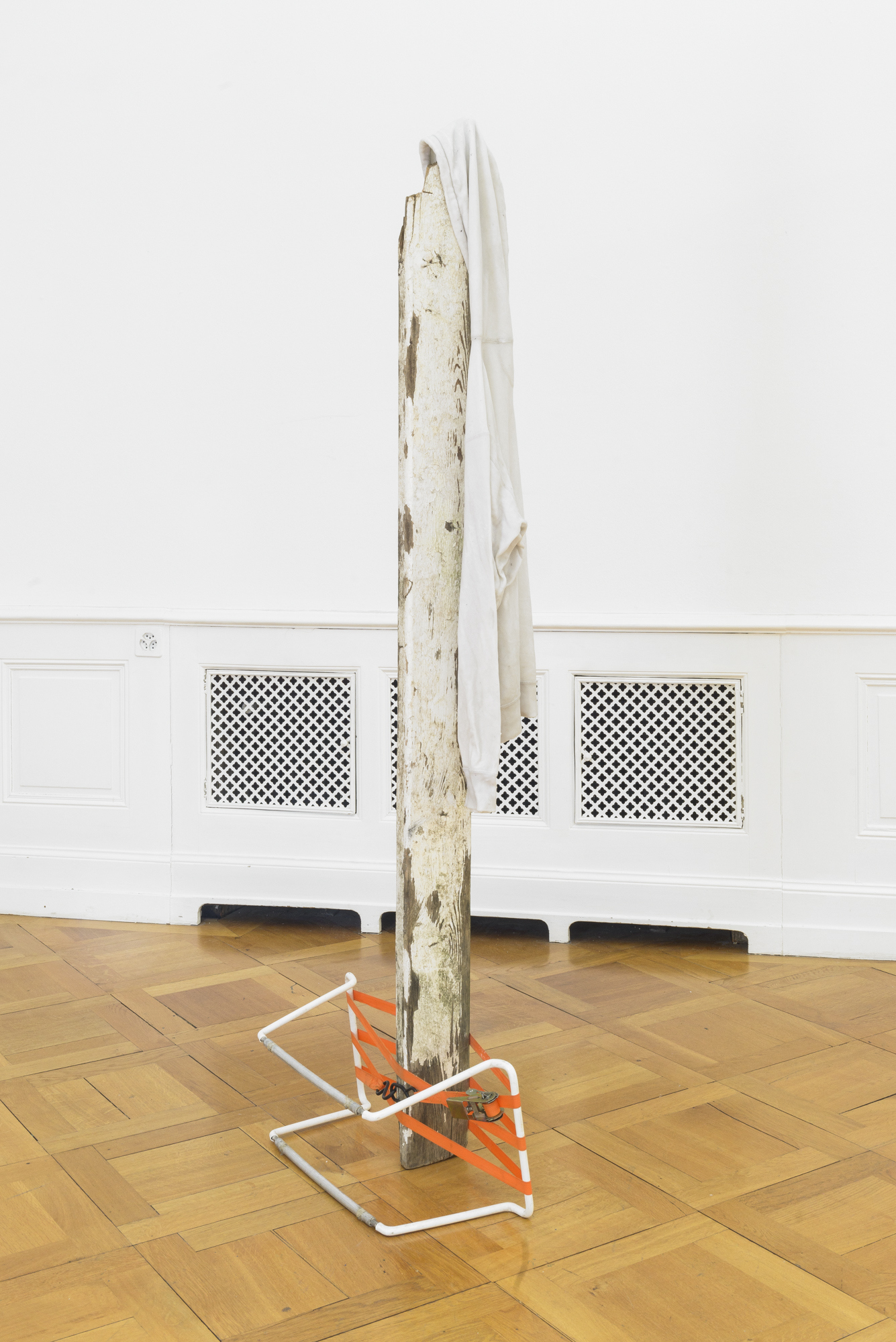 Yvan Alvarez, Hoodie (makeshift devices), wood, metal, hoodie, wax, strap, 192 x 60 x 31 cm, 2023