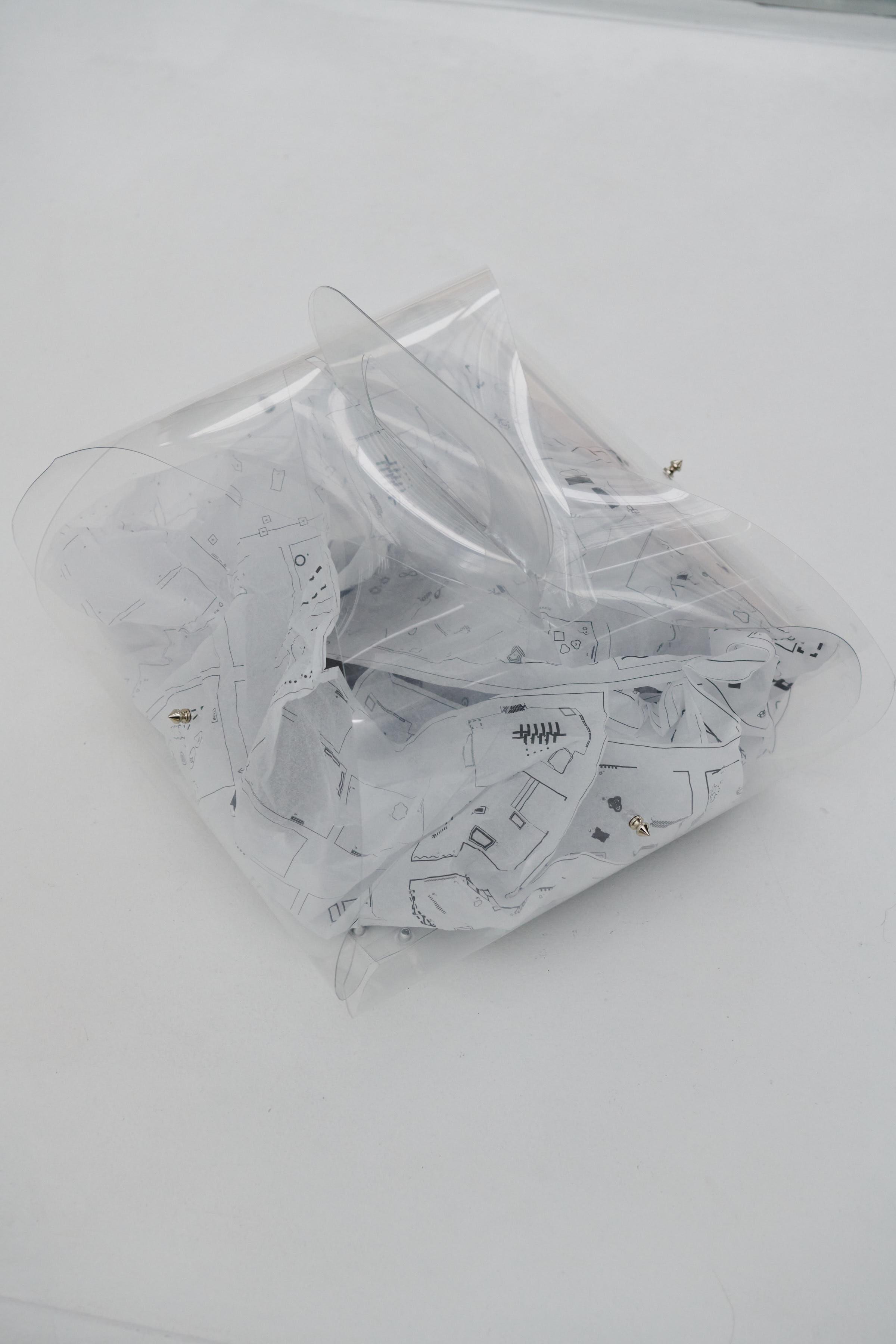 Lisa Jäger Morel pouch for Meltem Rukiye Calisir JUDASOHR- had nature any outcast face PVC, metal spikes 2023