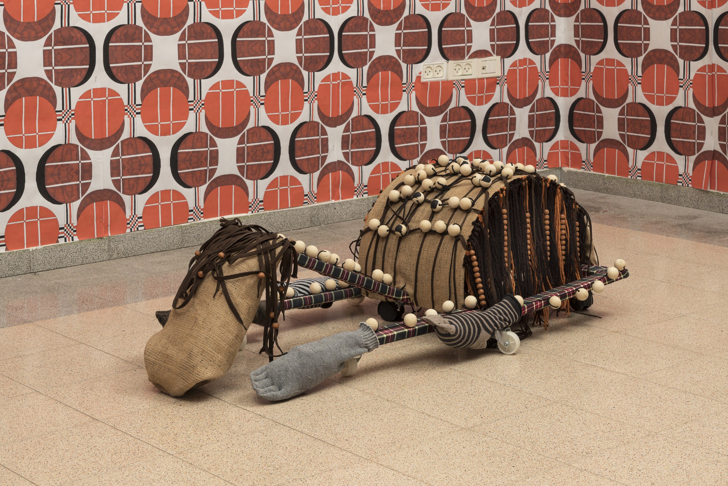 Chiquita, 2022, Wood, fabric, beads, wheels, acrylic, 40X120X60 cm