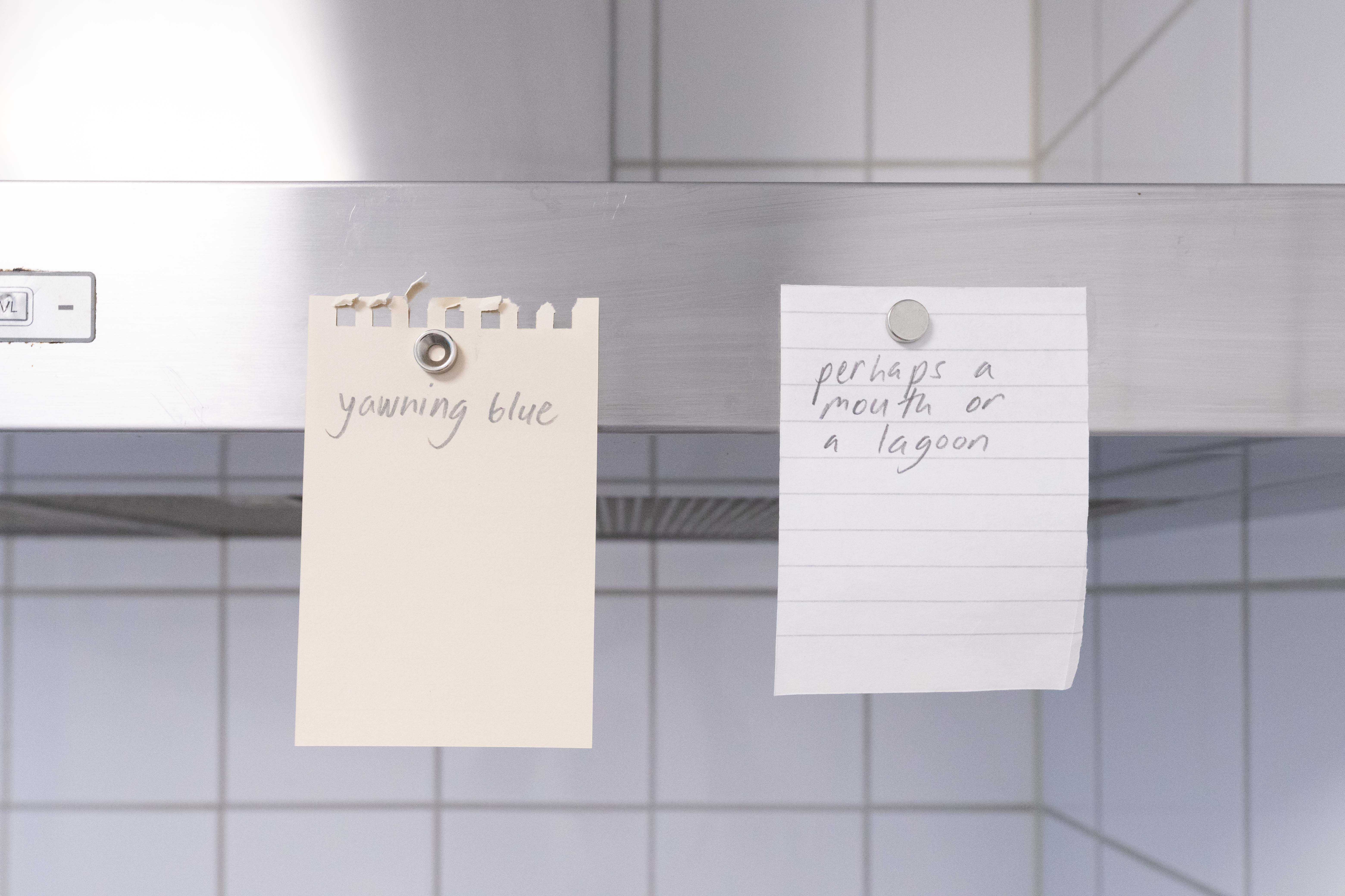 Pitted Dates: FOR SOMETHING TO BE FILLED, Maarit Mustonen: a commissioned poem, pencil on paper, magnets, 8 x 7x10cm, 2023