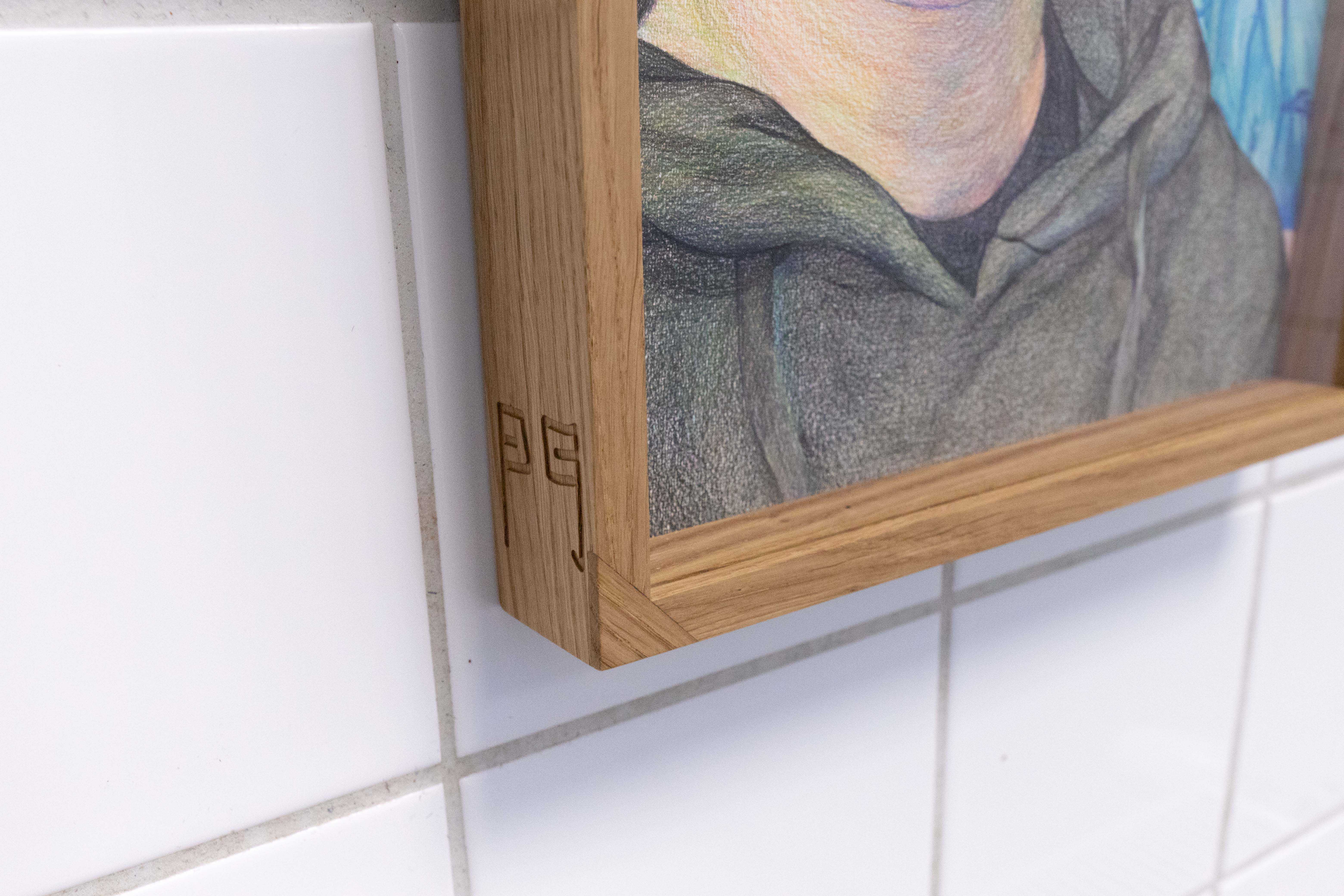 Pitted Dates: FOR SOMETHING TO BE FILLED, Minjee Hwang Kim: Self-Portrait with Blue Mountains, coloured pencil and ink on paper, oak, museum glass, Custom-made frame by Ville Arpiainen, 297x420mm, 2023