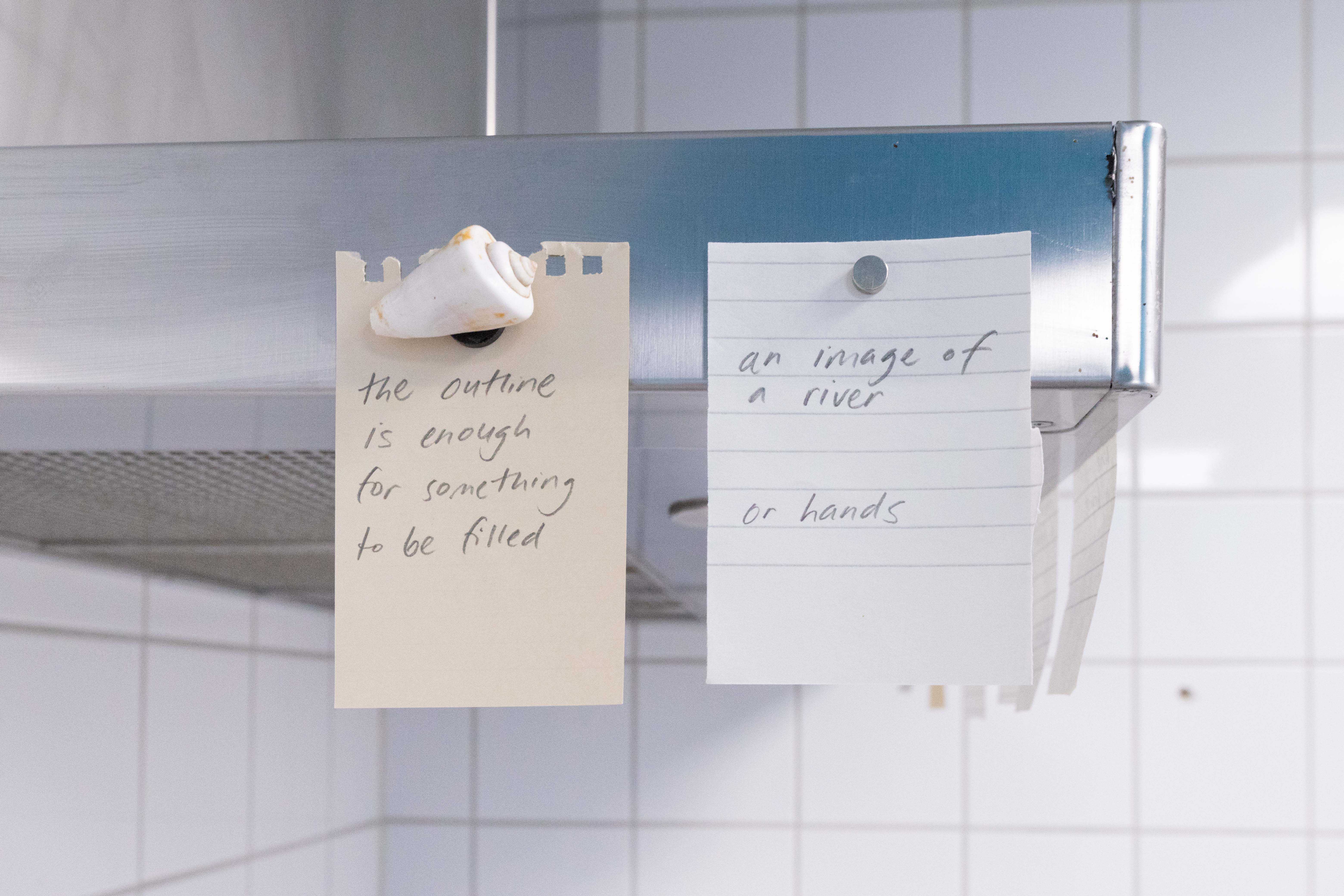 Pitted Dates: FOR SOMETHING TO BE FILLED, Maarit Mustonen: a commissioned poem, pencil on paper, magnets, 8 x 7x10cm, 2023