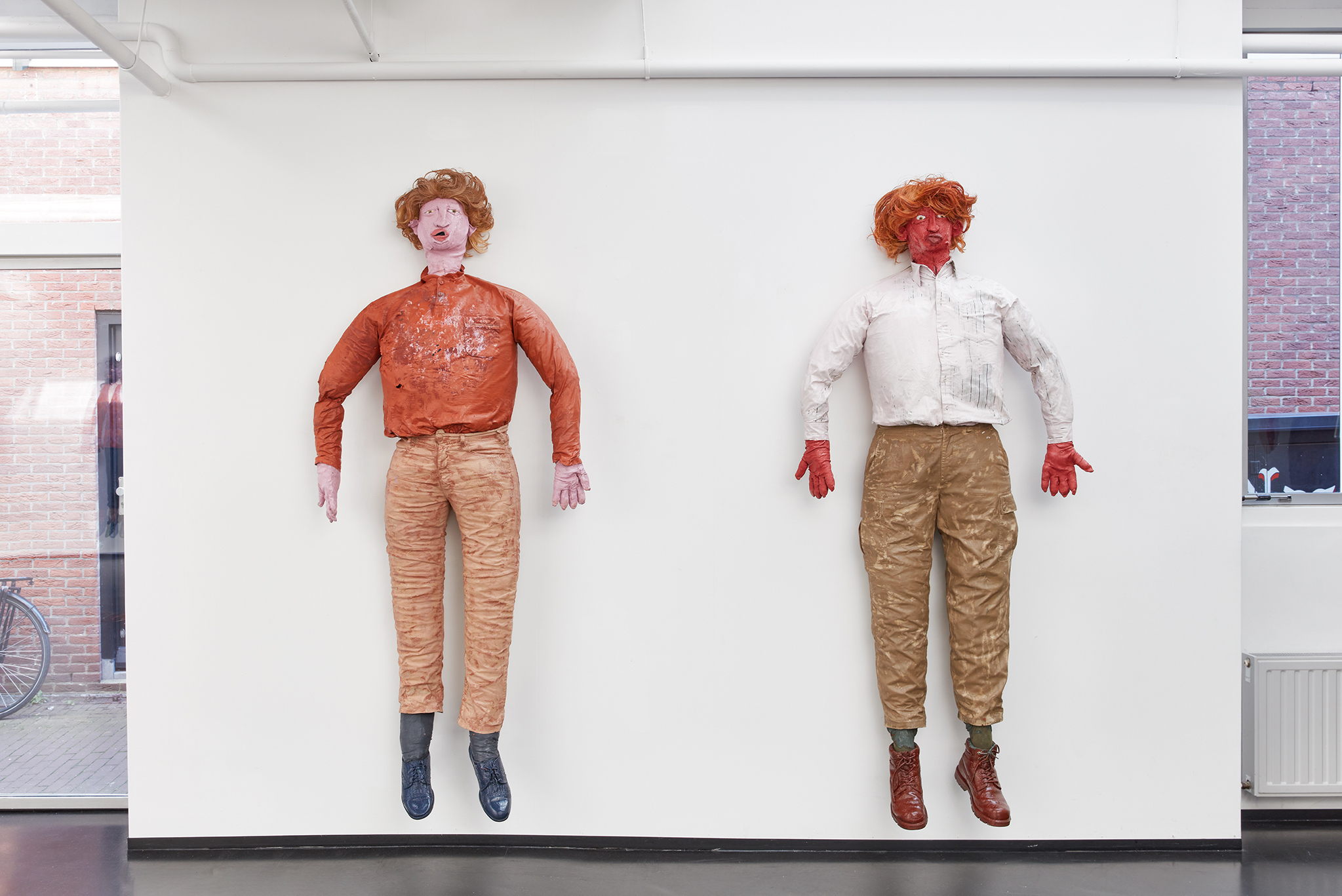 N. Dakota (puppet painting), 2023, oil paint on fabrics, life-size dimensions and S. Dakota (puppet painting), 2023, oil paint on fabrics, life-size dimensions