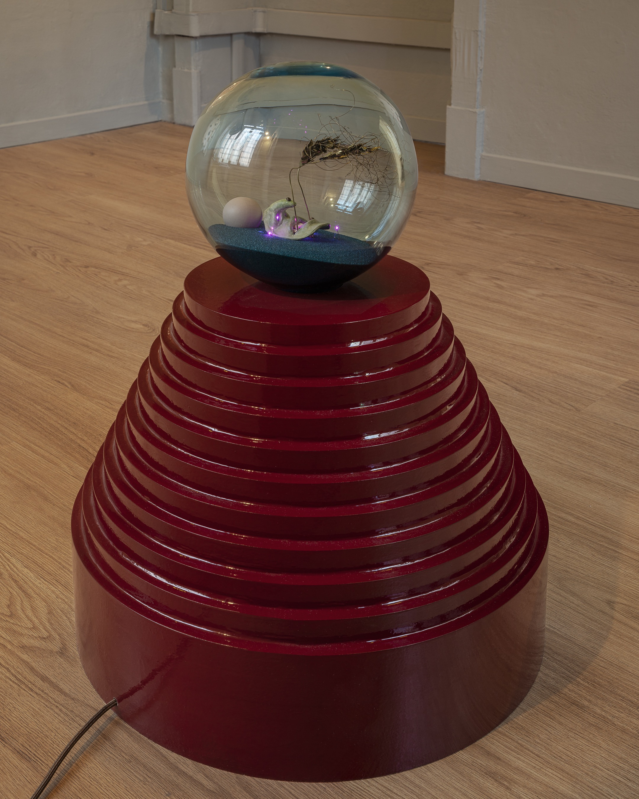 Tai Shani, NHA2, 2021, Wood, glass, brass, sand, epoxy, LED lights, d. 60x75 cm Courtesy: The Artist and Clima, Milan