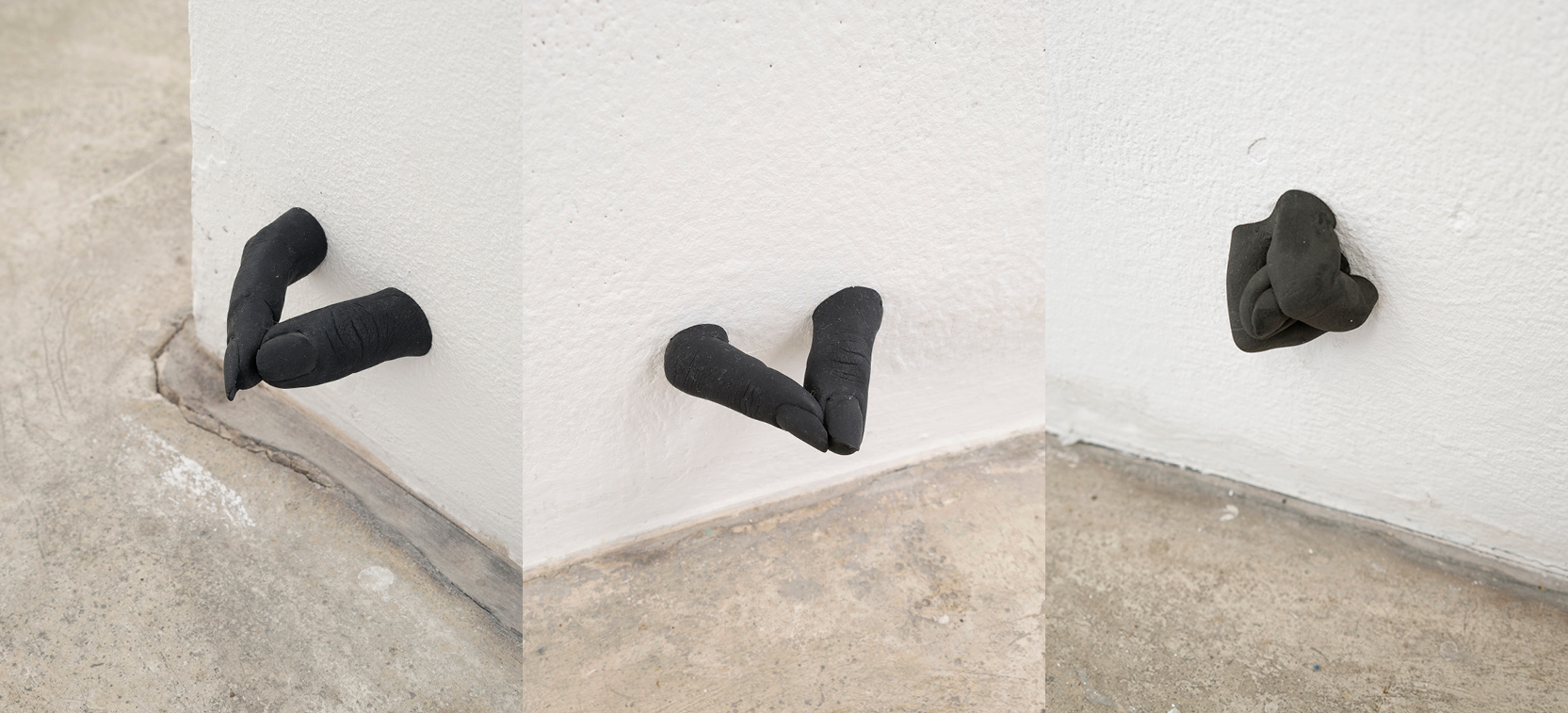 Installation Collage of gotcha by Elektra Stampoulou, 10 pairs of fingers made of plaster, black pigment, each ca. 10x7x2cm, 2023