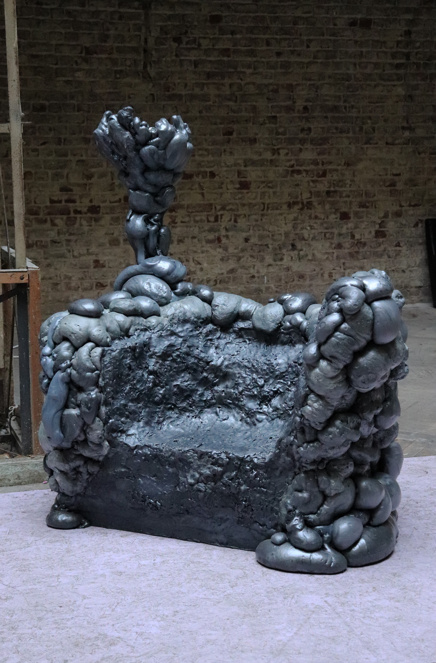 Fabien Karp, Magma Throne, PU foam, wood, electric wires, light bulb, polystyrene, 120 x 77 x 140 cm, 2022