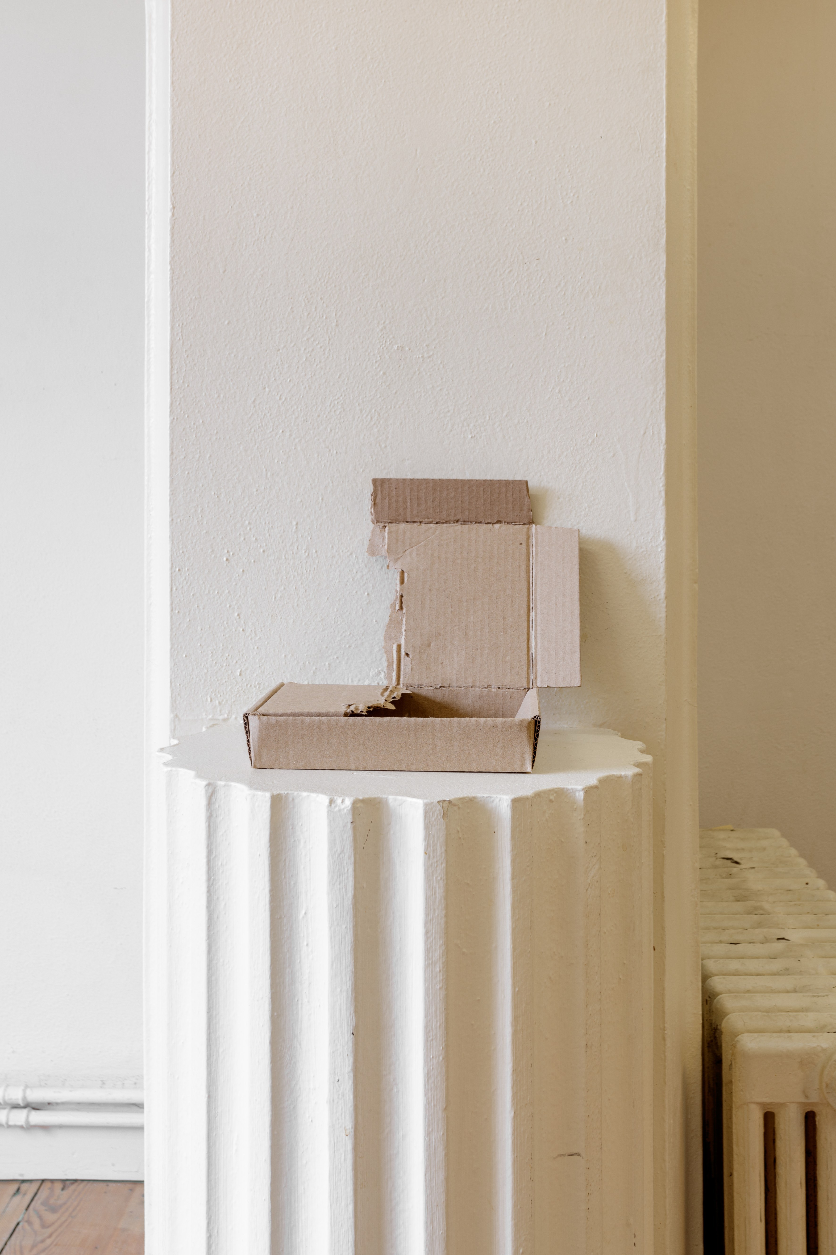 âUnboxing (3)â, 2022, cardboard, dimensions vary