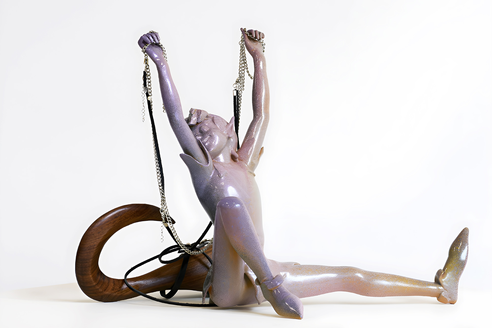 Isaac Lythgoe, Find my Old Cold Heart, 2022, Stainless steel, leather, PLA, hardware. automotive paint, lacquer. walnut, epoxy. 37 x 29 x 32 cm.