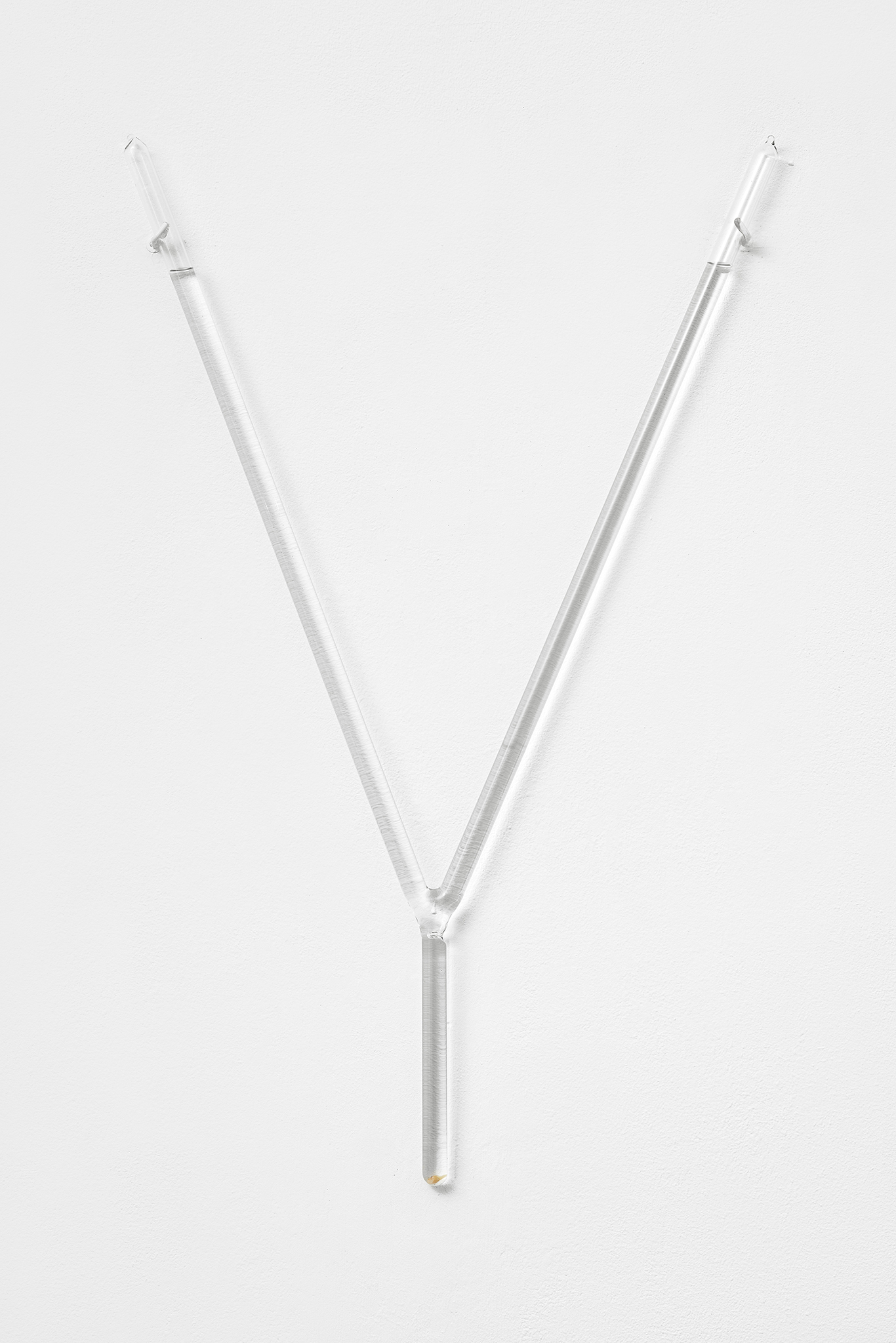 Paolo Bufalini, Y (Luca), 2023. Borosilicate glass, hydrochloric acid, water, milk tooth, 48x80x1,8cm Courtesy of the Artist and La Rada, Locarno. Photography by Tiziano Ercoli & Riccardo Giancola