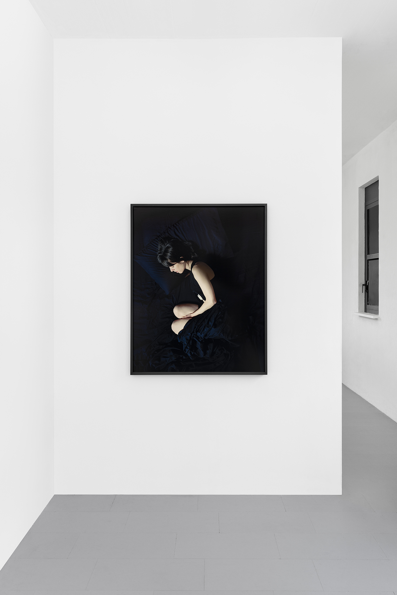 Detail of Paolo Bufalini, Y (Luca), 2023. Borosilicate glass, hydrochloric acid, water, milk tooth, 48x80x1,8cm Courtesy of the Artist and La Rada, Locarno. Photography by Tiziano Ercoli & Riccardo Giancola