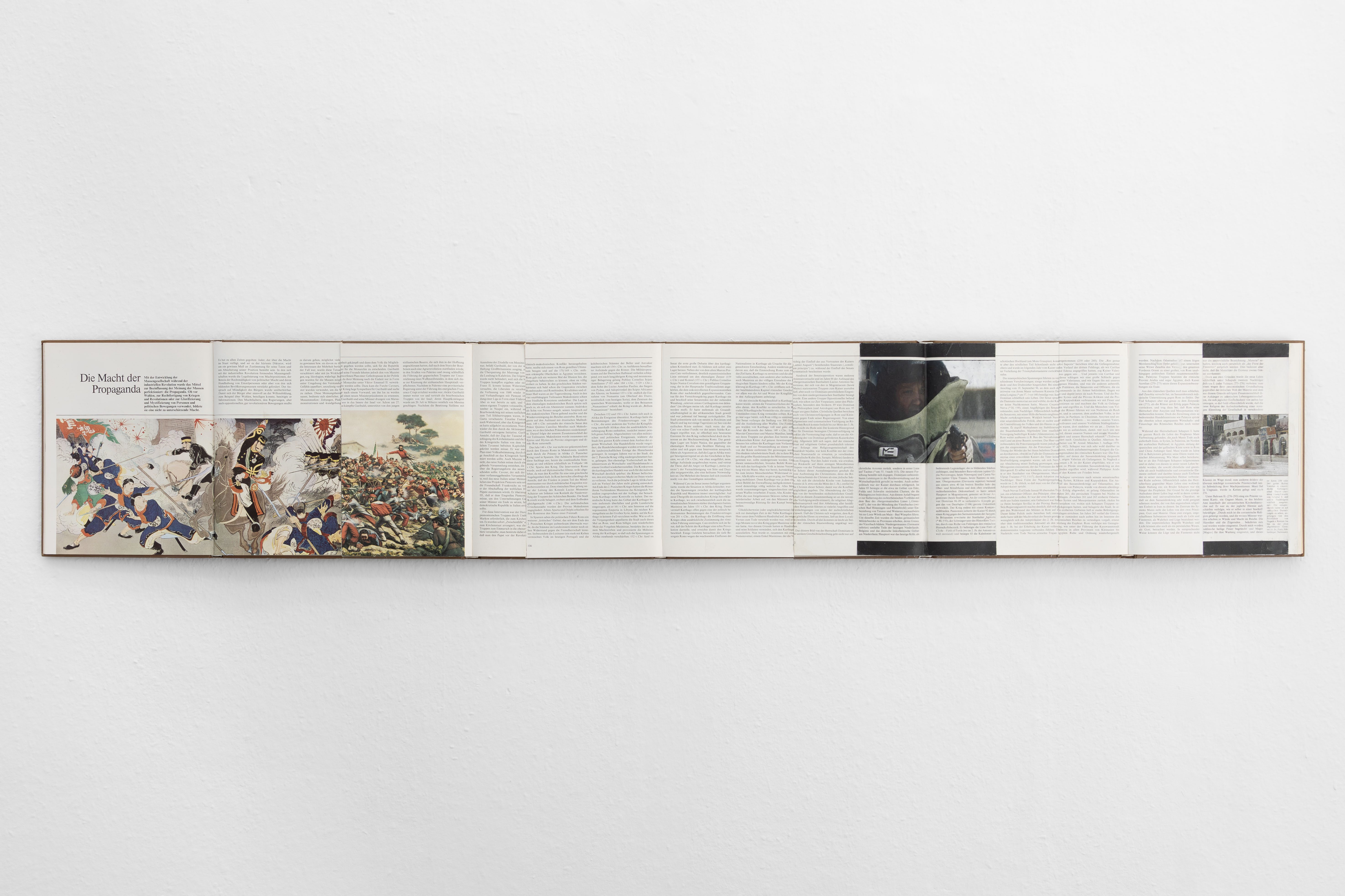 Dan Vogt, Die Macht der Propaganda, 2023, Acrylic, toner on books, 159cm x 27cm x 3cm