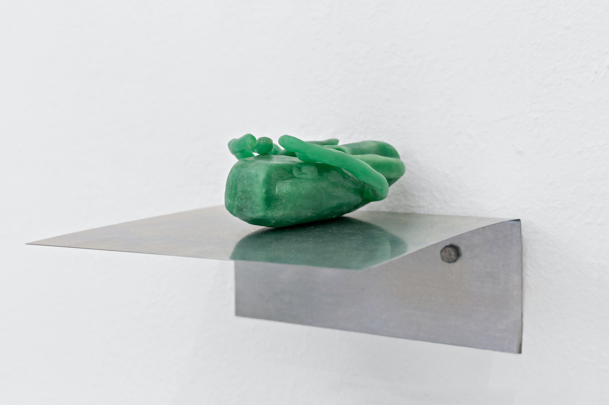 Therese Bülow, "Hull (Connect)", 2023. Wax, steel shelf, 24.0 x 28.0 x 4.0 cm