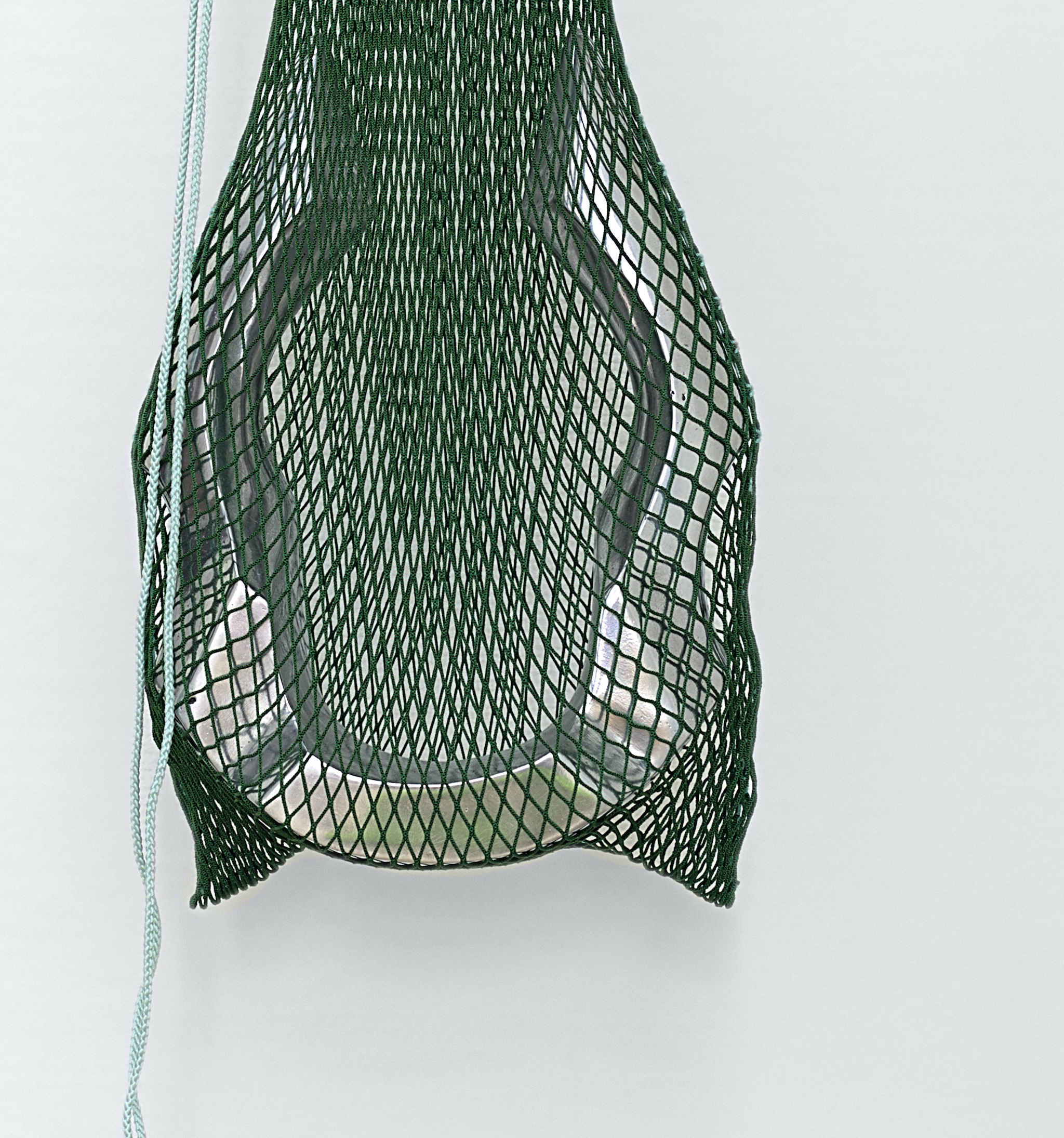 Therese Bülow, "Tongue Twister", 2022. Polished aluminium, nylon net, sandblasted metal, 82.0 x 23.0 x 27.0 cm