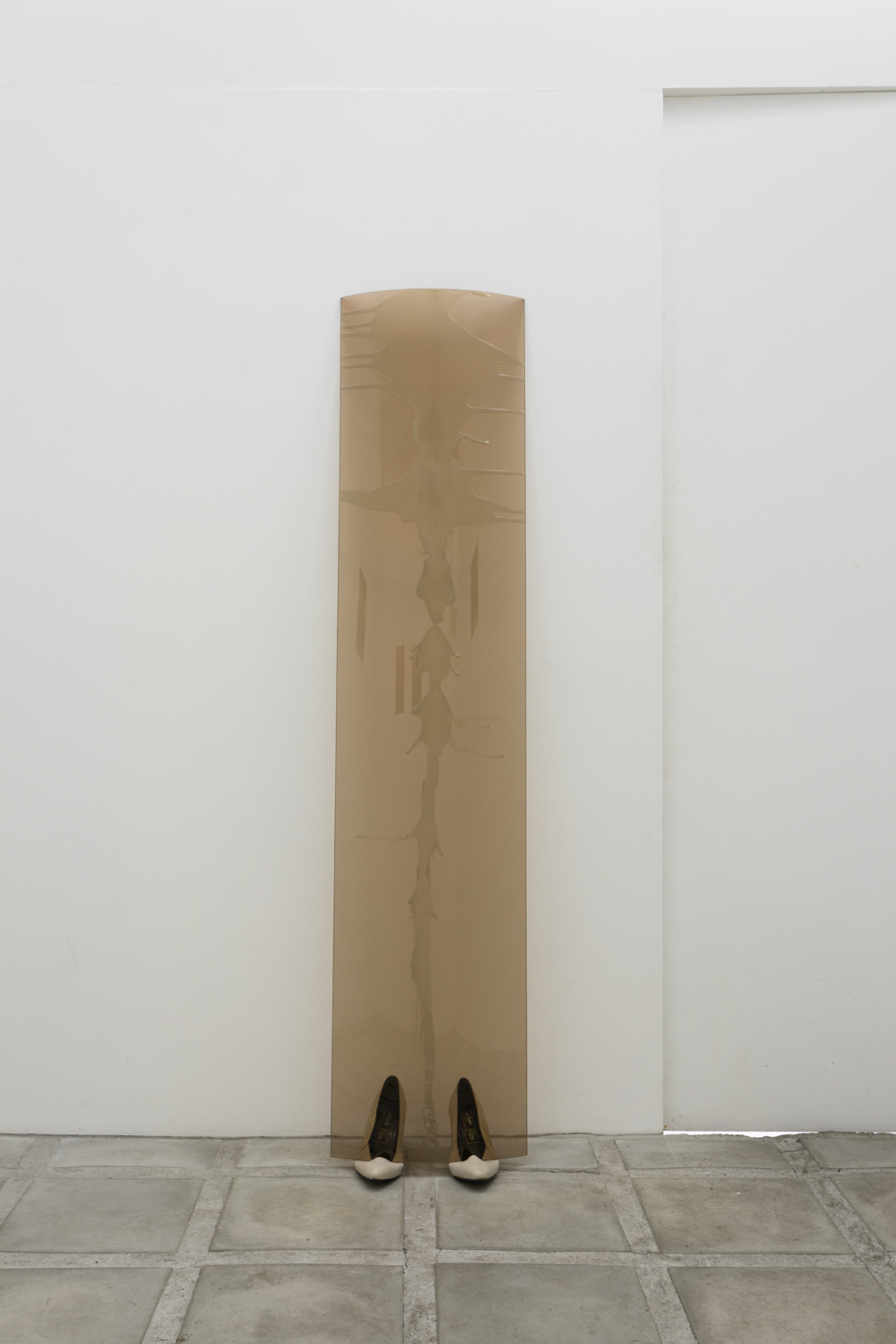 The Truth Revives The Golem, 2023, Glass, wax, shoes made in Yugoslavia 60 cm x 150 cm