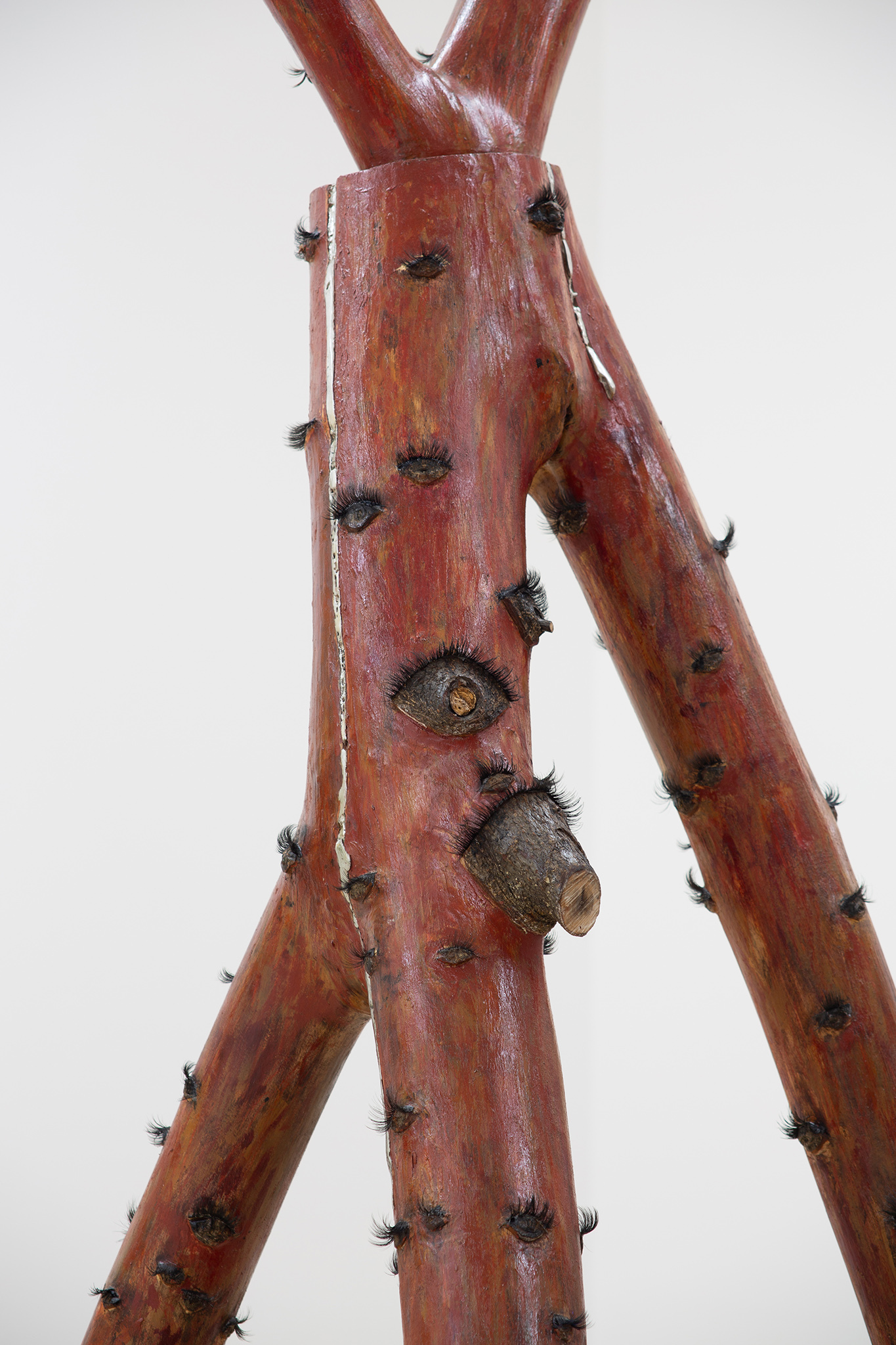 Milda Lembertaitė, Give Yourself New Life, 2021. Found Wood (Maryon park, London), Flint, Oil Paint, Pewter, Synthetic Eyelashes, WWII Prosthetics, Acupuncture needles, 225 x 67 x 47 cm