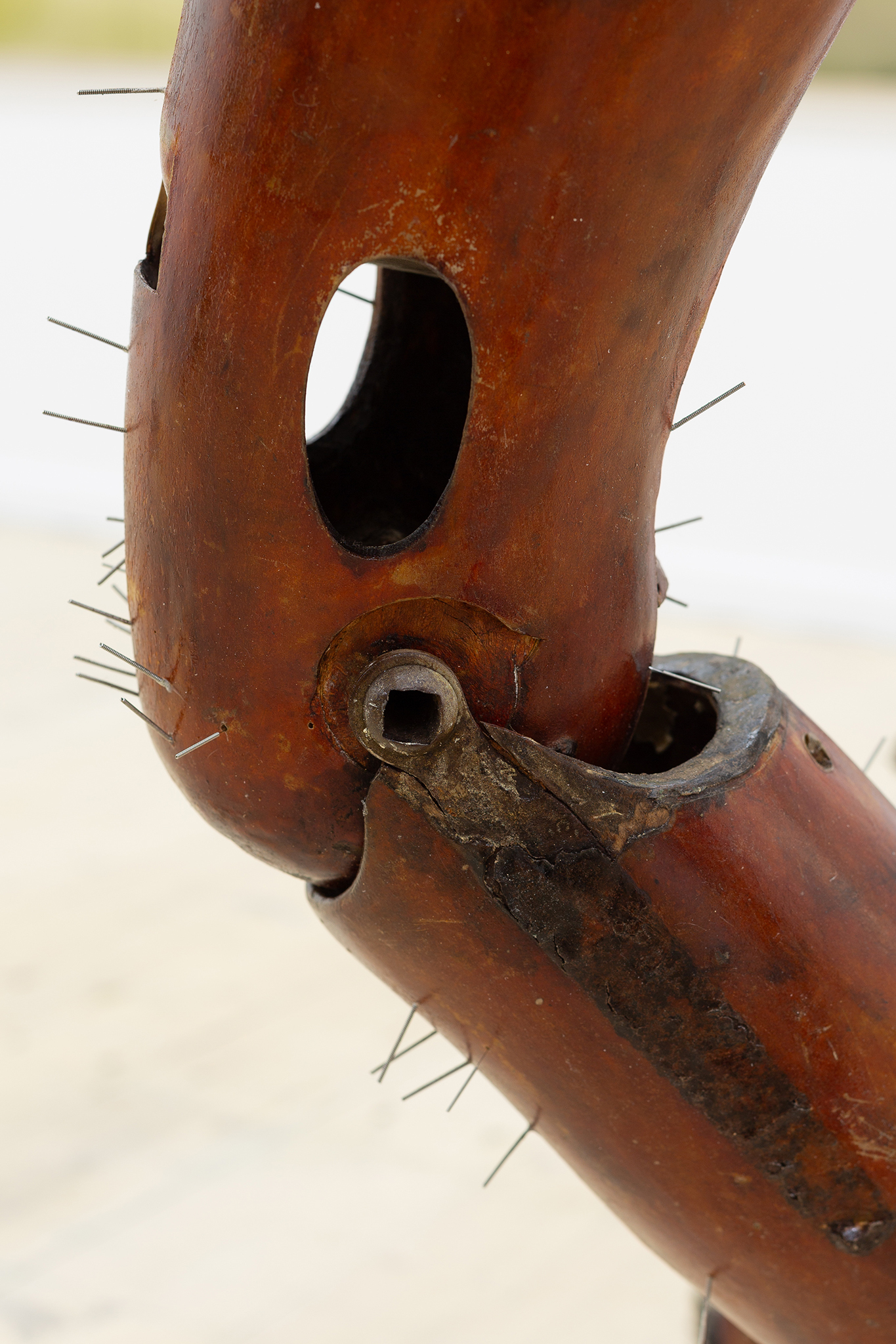 Milda Lembertaitė, Give Yourself New Life, 2021. Found Wood (Maryon park, London), Flint, Oil Paint, Pewter, Synthetic Eyelashes, WWII Prosthetics, Acupuncture needles, 225 x 67 x 47 cm