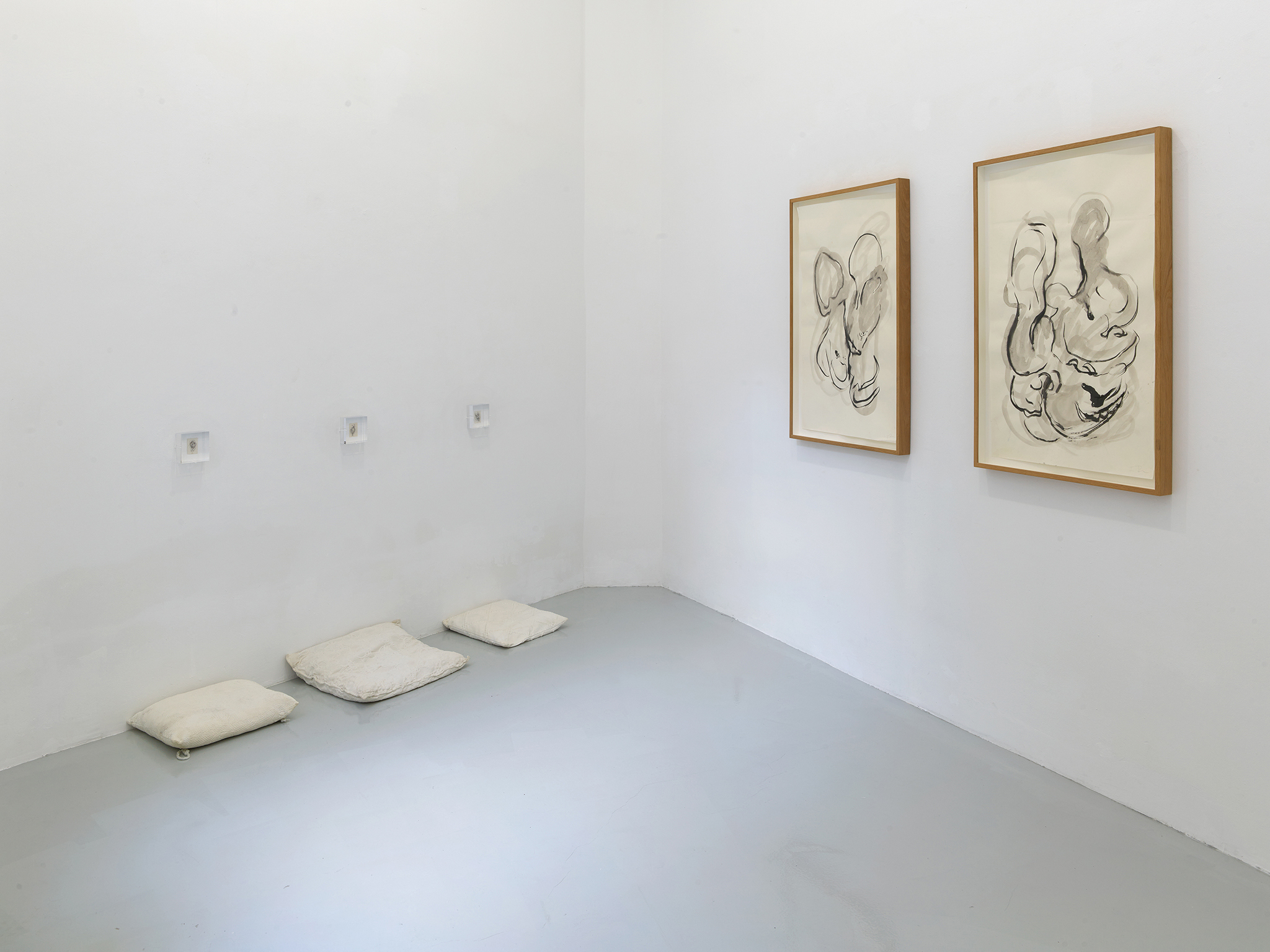 Installation view | ›Mini Vagina‹ | Pencil on paper, plexi glass, cushion | 3,5 x 5,5 cm | 10 x 10 cm (framed) | 2023 | ›Untitled‹ | Japanese Ink on paper | 88 x 54 cm (framed) | 2023