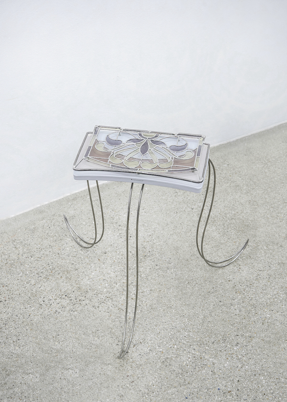 Ju Young Kim âIn the night I wish you a good dayâ 2023, Aircraft tray table, Glass, Lead, Tin, Stainless steel 77 x 69 x 63.5 cm