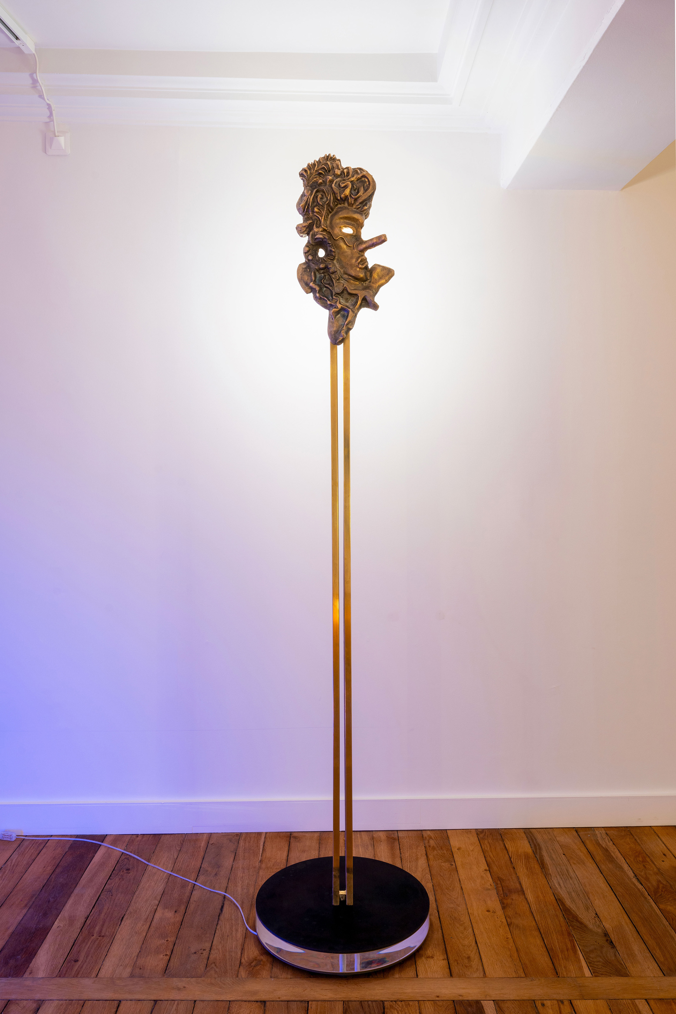 Than Hussein Clark, *Pinocchio Floor Lamp (Entrance # 4 - The Arrival of the Ambassador of D’Arros)*, 2023, Brass, acrylic, blackened steel, porcelain light bulb, patina, 222 × 50 × 50 cm