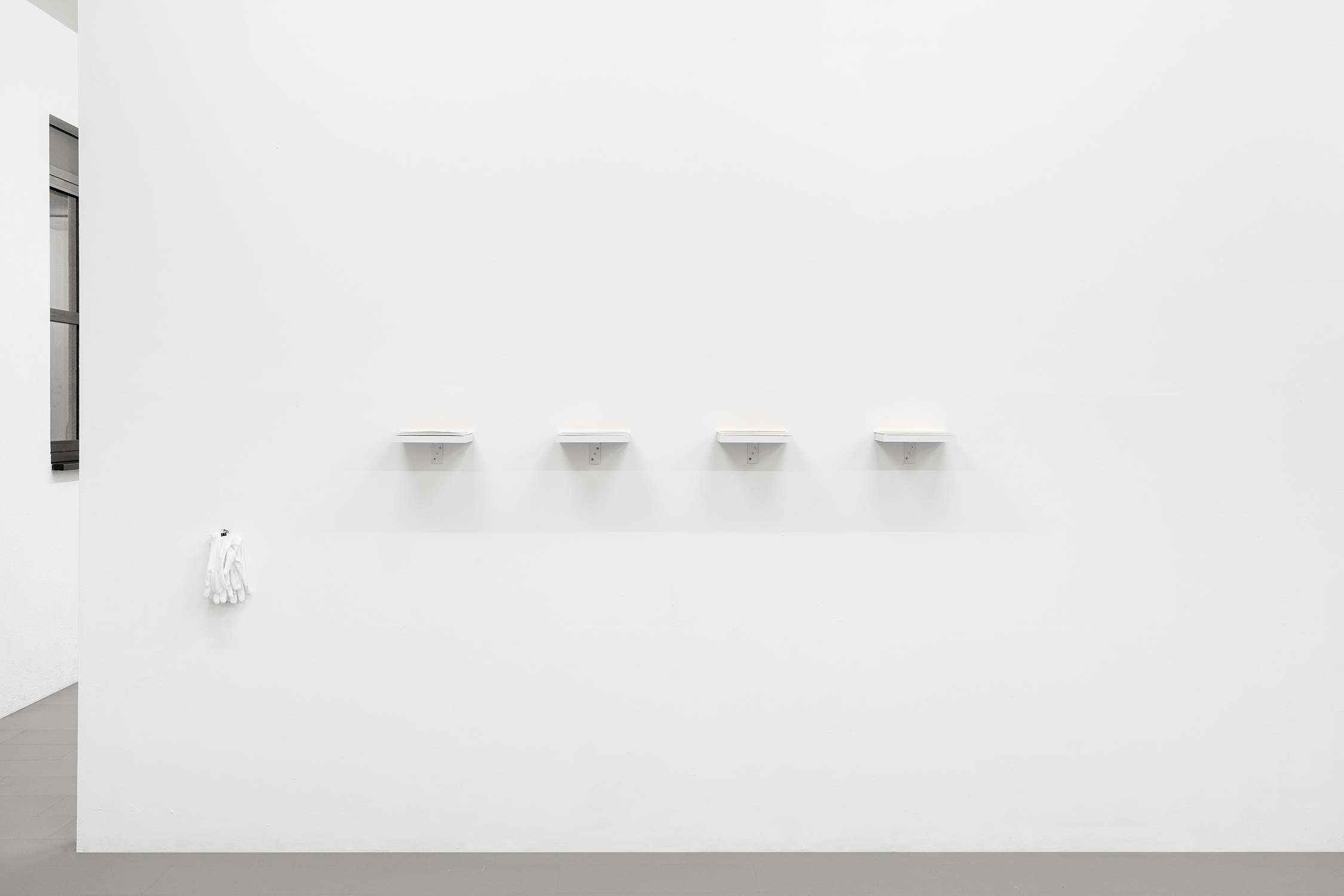 Exhibition View Group Show «Gulp; view on Jacopo Valentini, From the series Paesaggi da Tavola, 2023, Inkjet print, wood and cotton gloves, 20 x 220 cm» at La Rada, Locarno, 2023 / Photo: Riccardo Giancola / Courtesy: the artist and La Rada