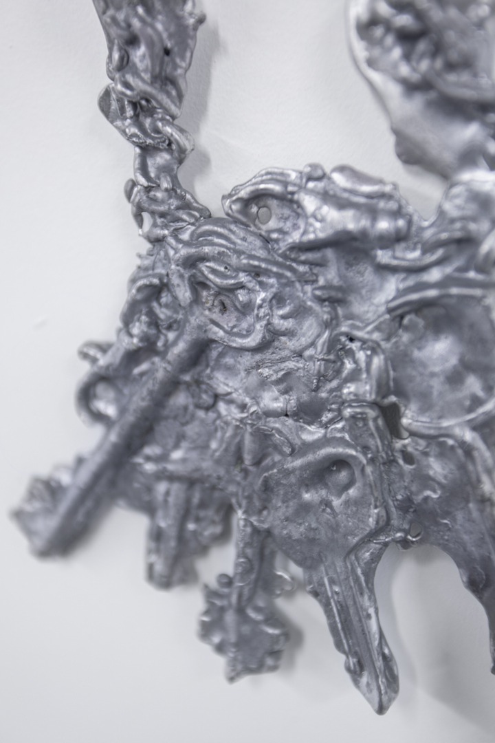 Ivan Venmer, Part of work 'Investor (Every evening I died and every morning I was born again. Resurrected), version ||, 2022 – 2023, lead, glue, titanium, 38 x 25 x 2 cm, (Details)