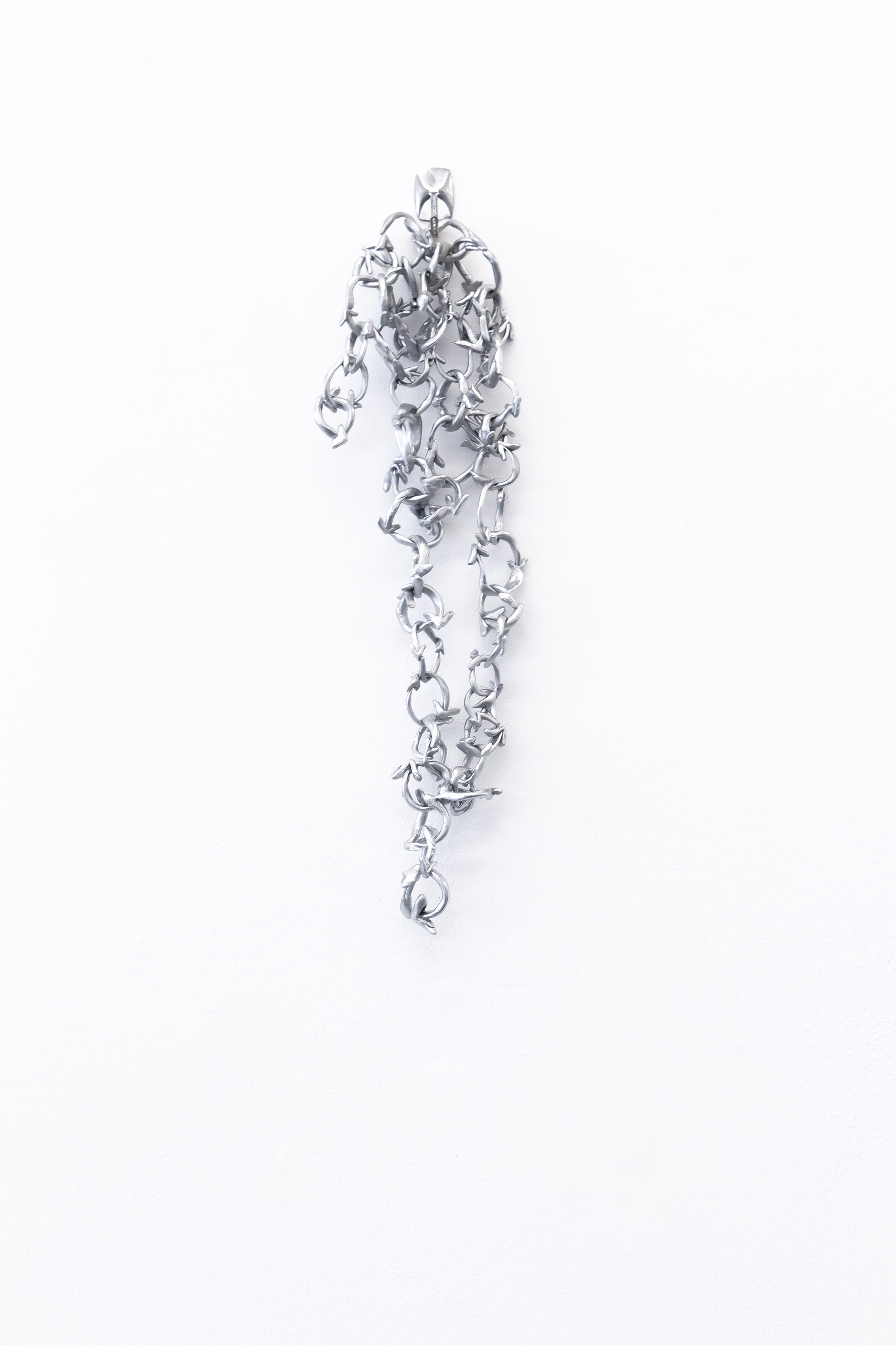 rererererere...rere.ico, object: thermoplastic, chrome paint, 40x13x1 cm, 2023.