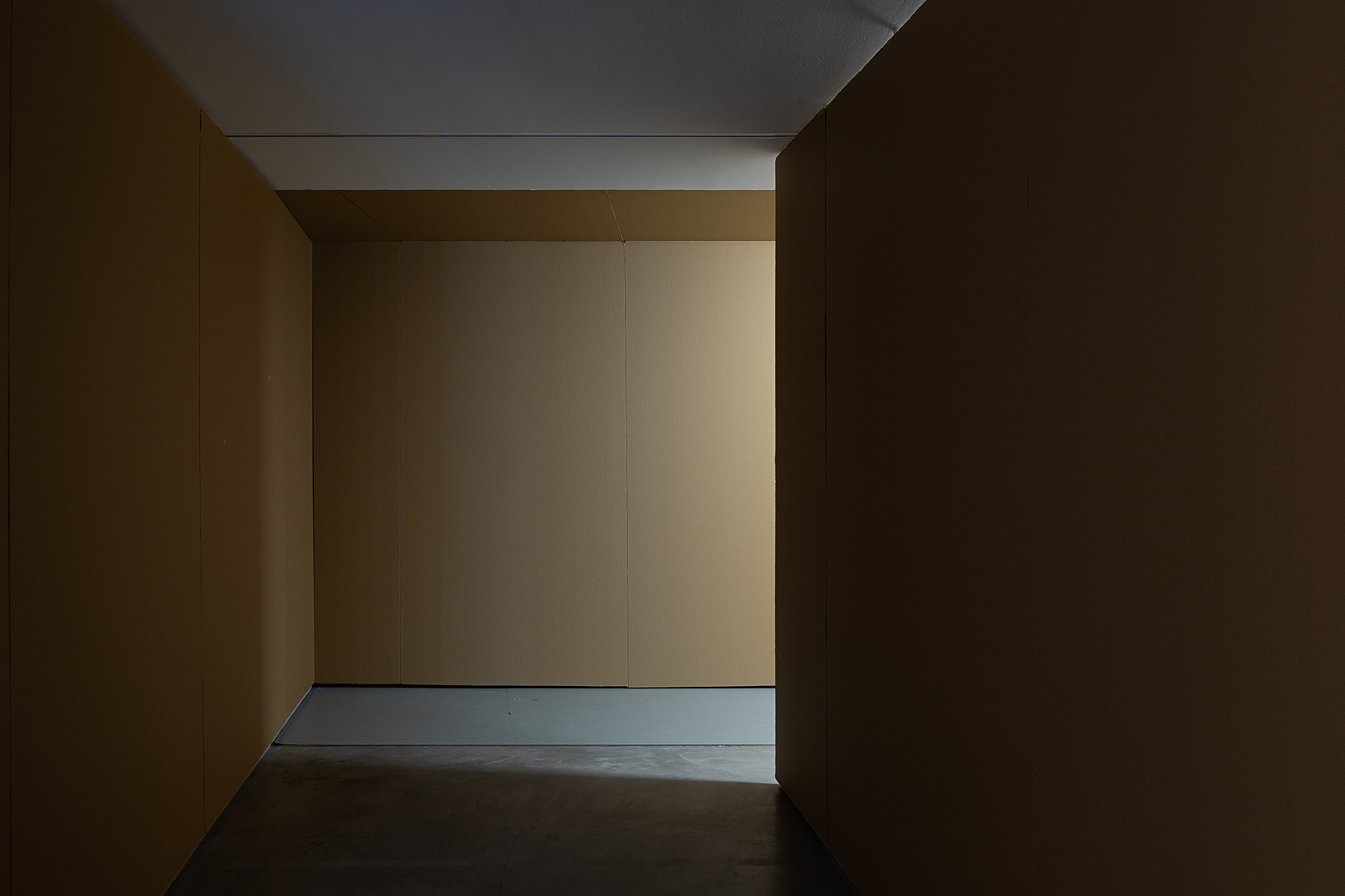 Ian Waelder. even in a language that is not your own, 2023. Site-specific path and environment, structure of honey-comb cardboard, air-dry porcelain.