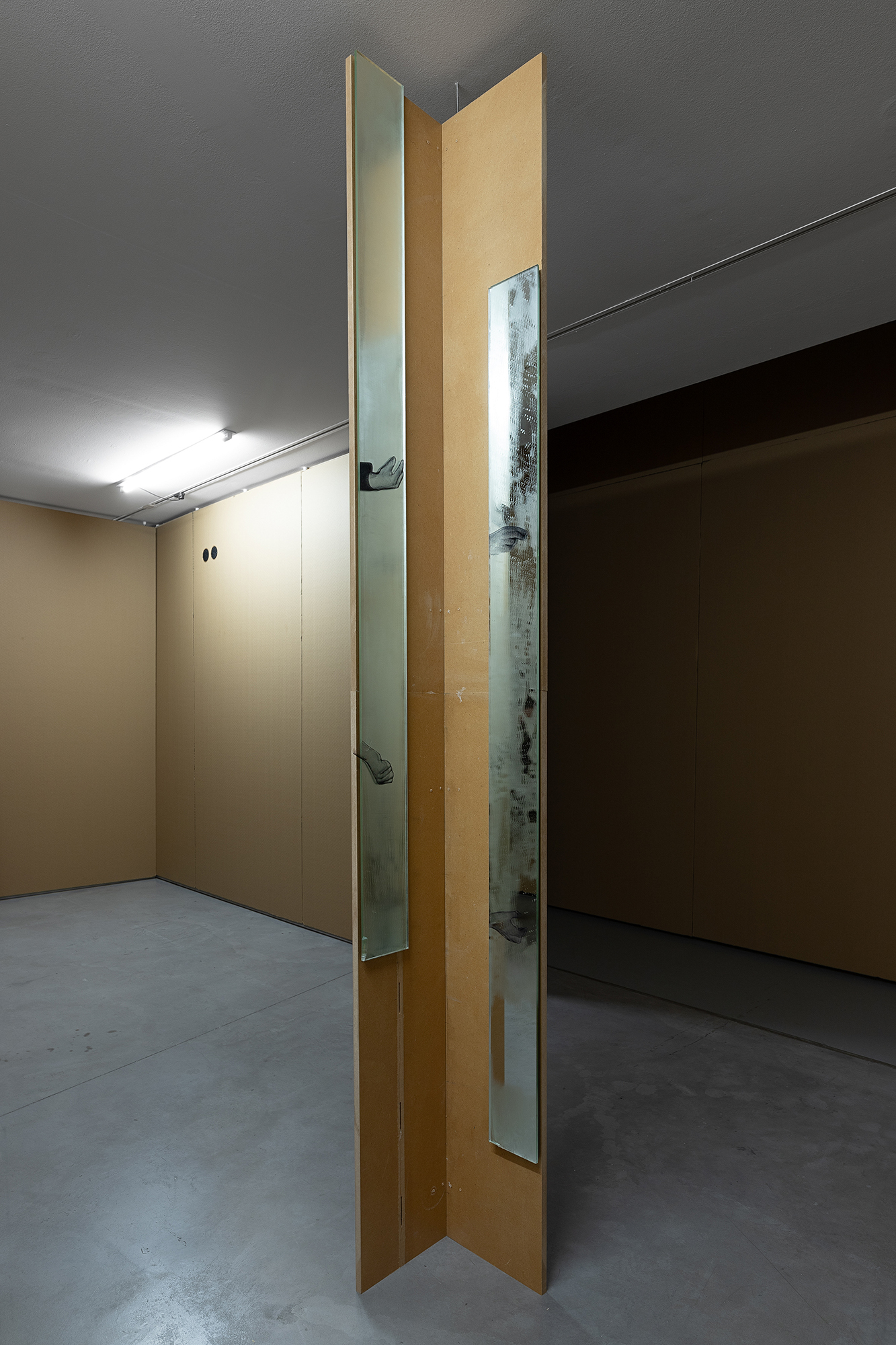 Ian Waelder. The Pianist (Something Remains), 2022â2023. MDF wood previously used as a table to sculpt clay, traces of clay, patinated mirrors, inkjet prints on acetate film, tape, air-dry porcelain. 235 x 28 x 26 cm
