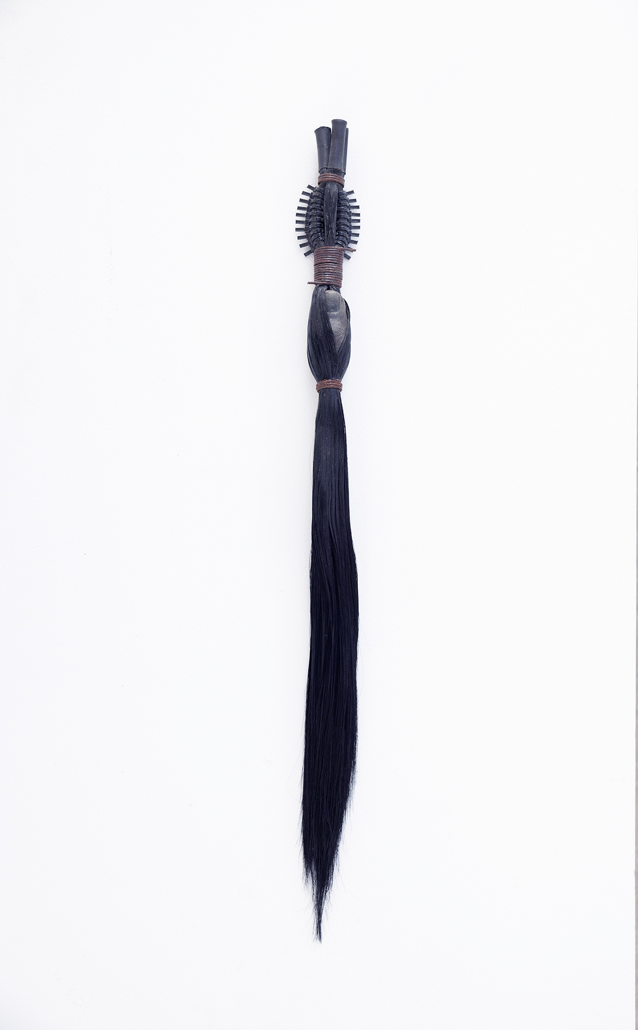 Taka Kono / godsend (1) / Hair, cement, steel wire, binding tape / 55Ã—5cm / 2021