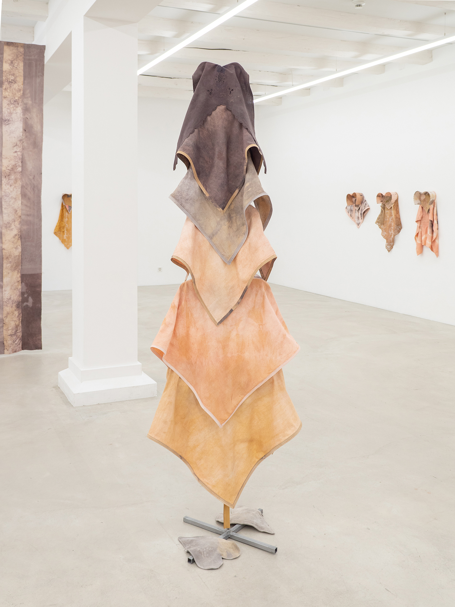 Worldly hearts pillar #1 , Anna Reutinger, Second hand linen, cotton, iron sulfate, tannic acid, onion skins, madder, alder buckthorn, steel, 206 x 75 x 40 cm
