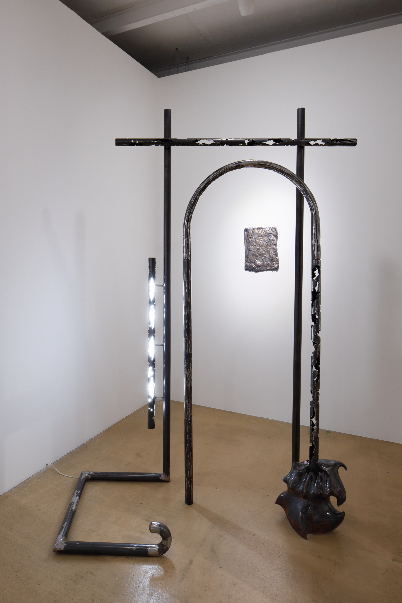 Karlīna Mežecka, You'll find a better path, 2024. Steel, LED light, ceramics, glaze.