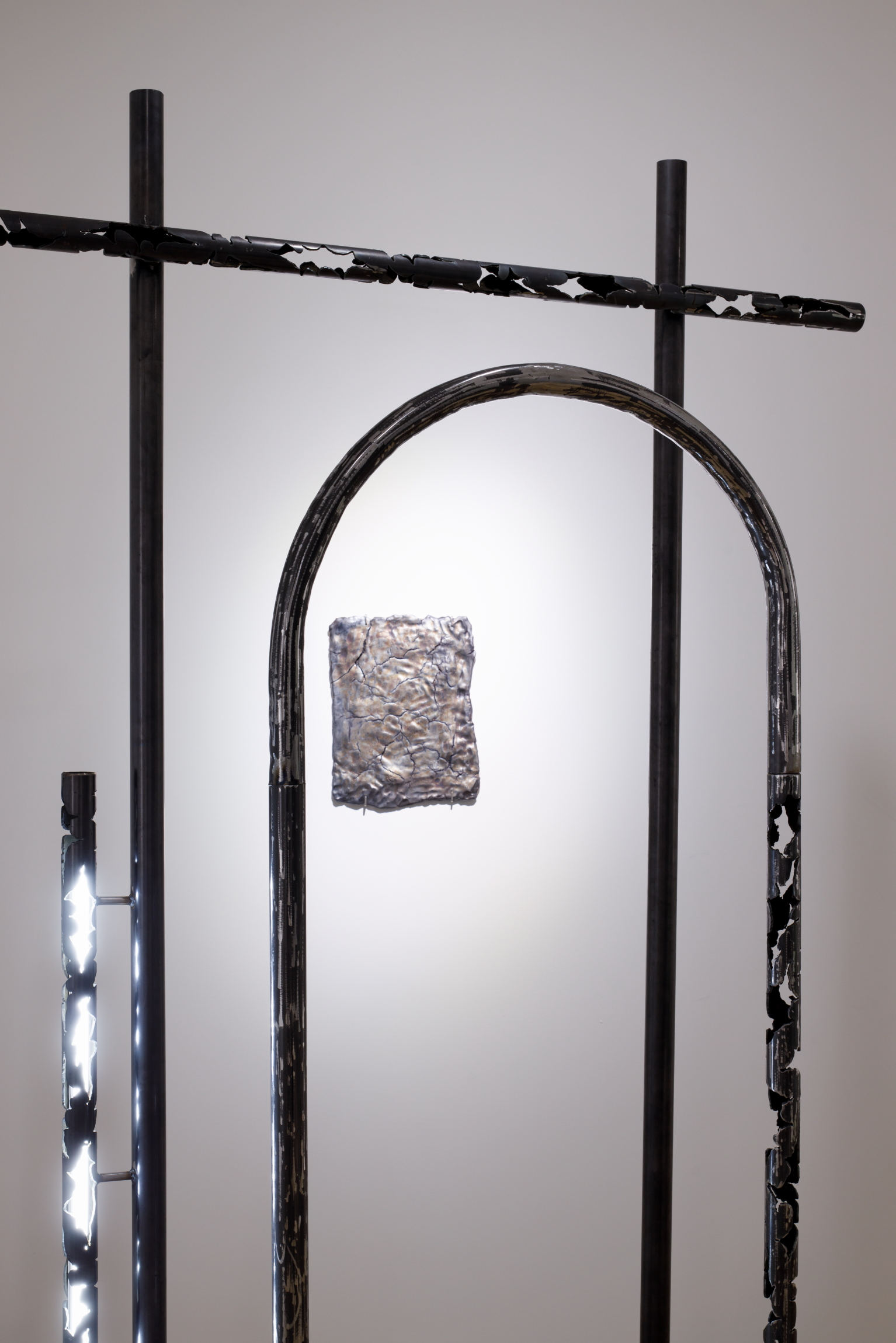 Karlīna Mežecka, You'll find a better path, 2024. Steel, LED light, ceramics, glaze.