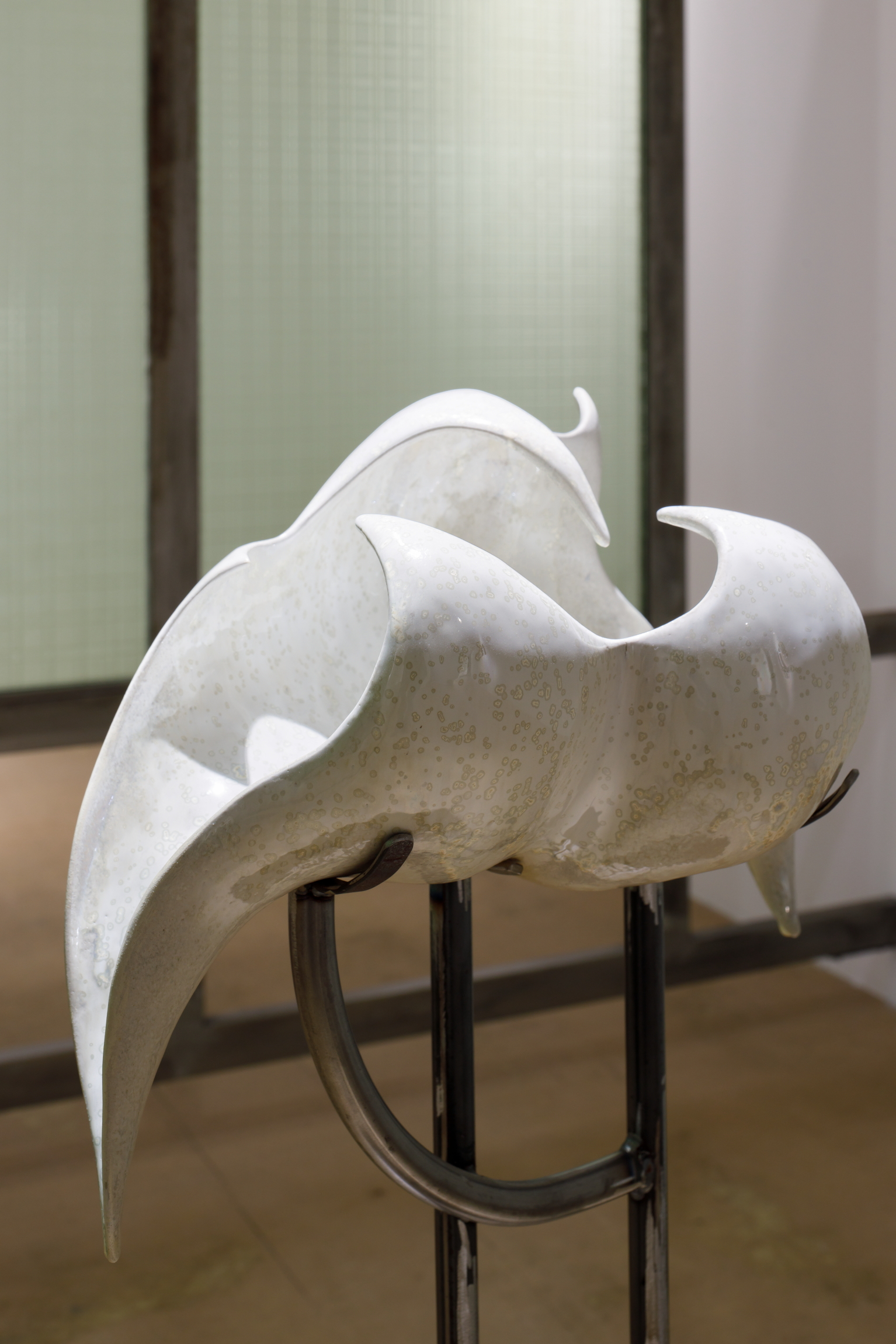 Karlīna Mežecka, Cradling Wail, 2024.  Ceramics, glaze, steel. 