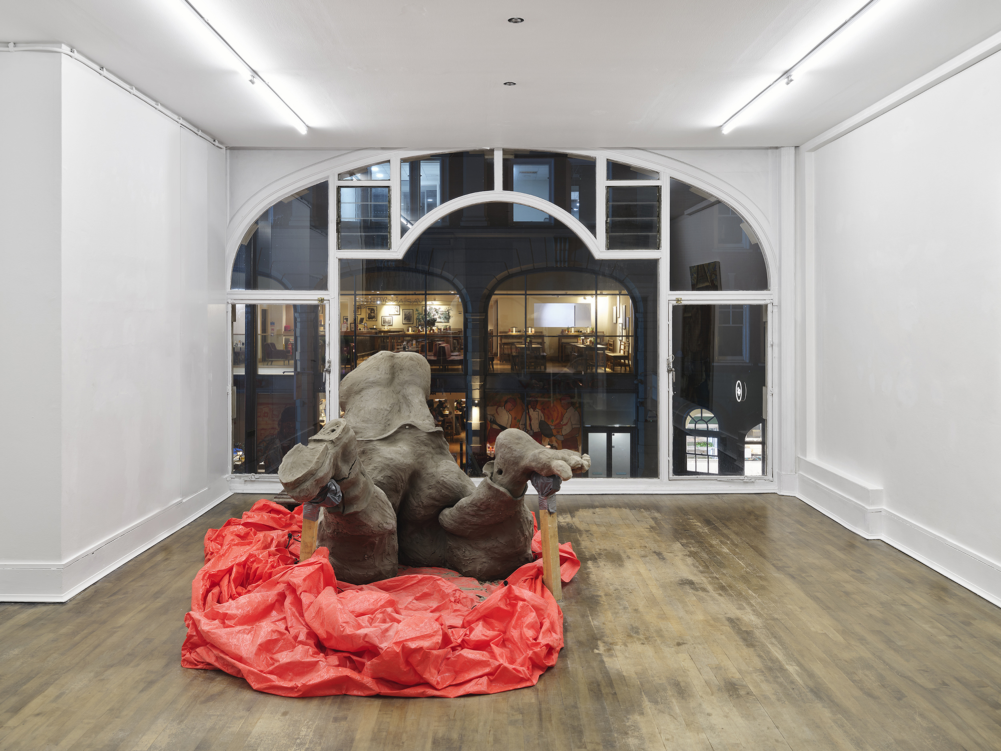 Benjamin Orlow, Ritual City, 2024 Clay, graphite, wood, tarp Dimensions variable