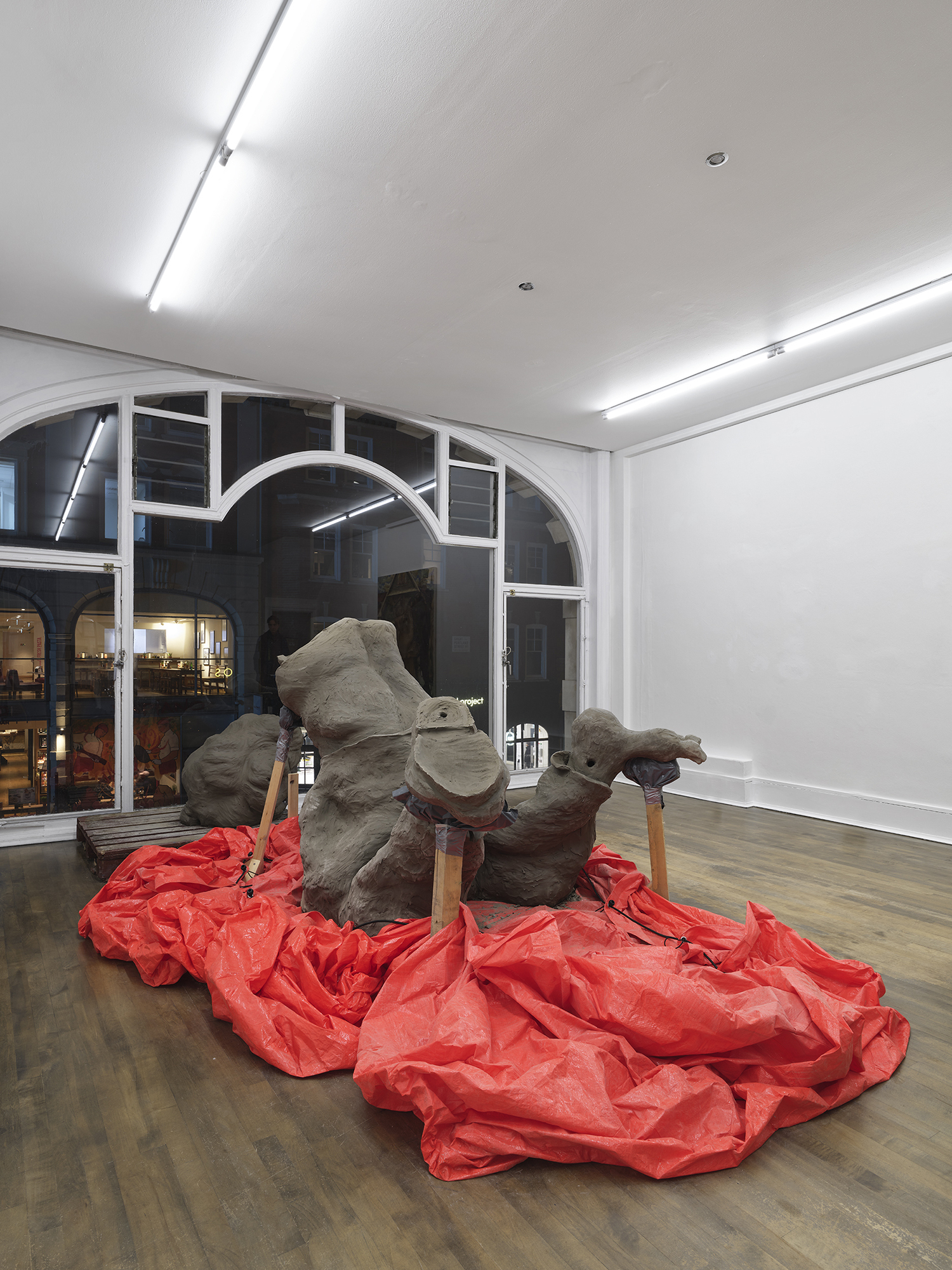 Benjamin Orlow, Ritual City, 2024 Clay, graphite, wood, tarp Dimensions variable