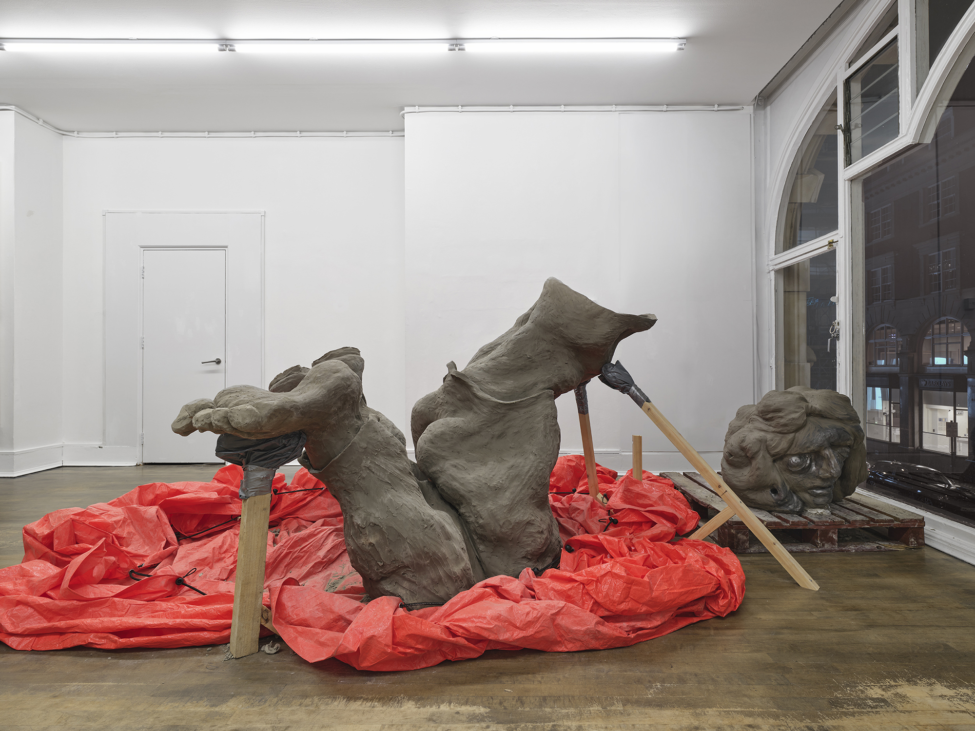Benjamin Orlow, Ritual City, 2024 Clay, graphite, wood, tarp Dimensions variable