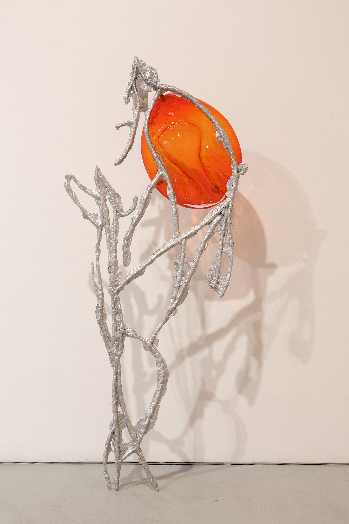 Pakui Hardware, Inflammation, 2024. Casted aluminium, glass, stainless steel, rubber, 150x64x35 cm