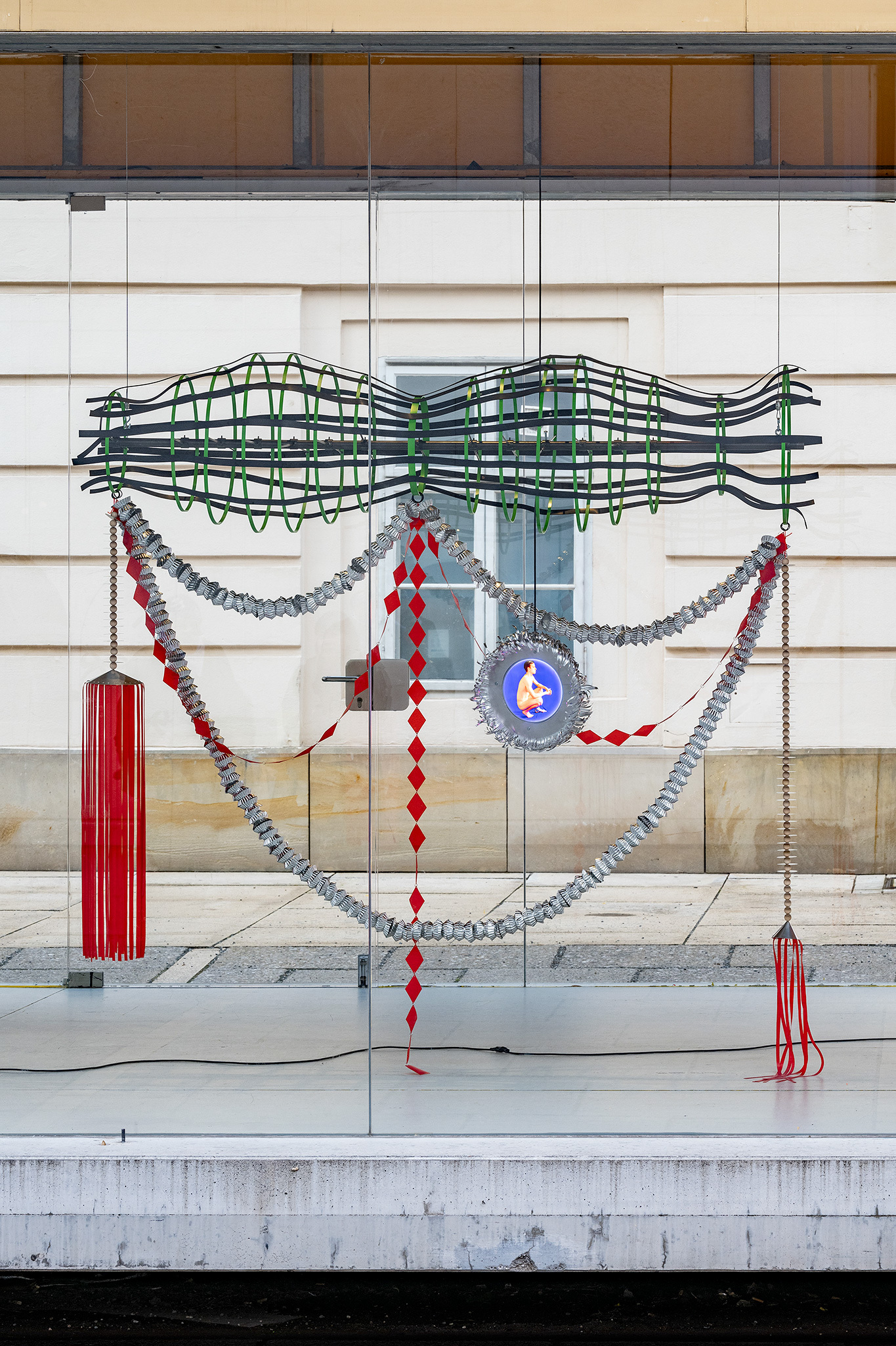 Paul R.1 (Amulett), 2024 Steel, paint, wood, plastic, industrial aluminum foil, rubber, magnets, foil laminated on Plexiglas, lamps, cable, 196 x 220 x 50 cm